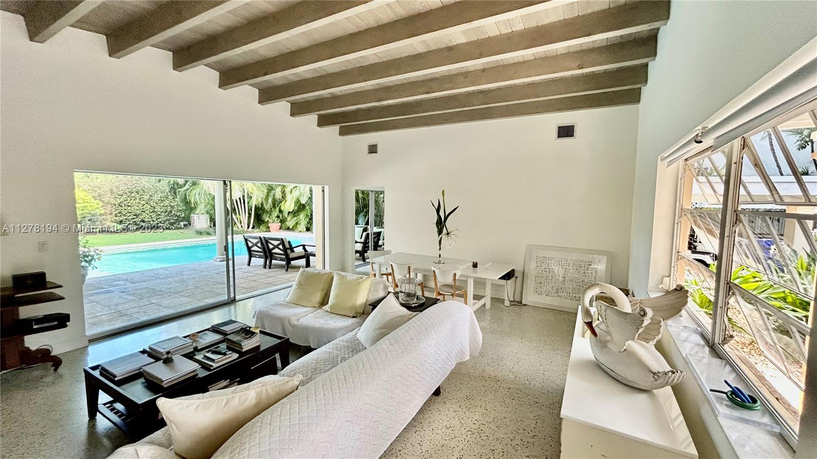 High-ceiling living/ dinning great room