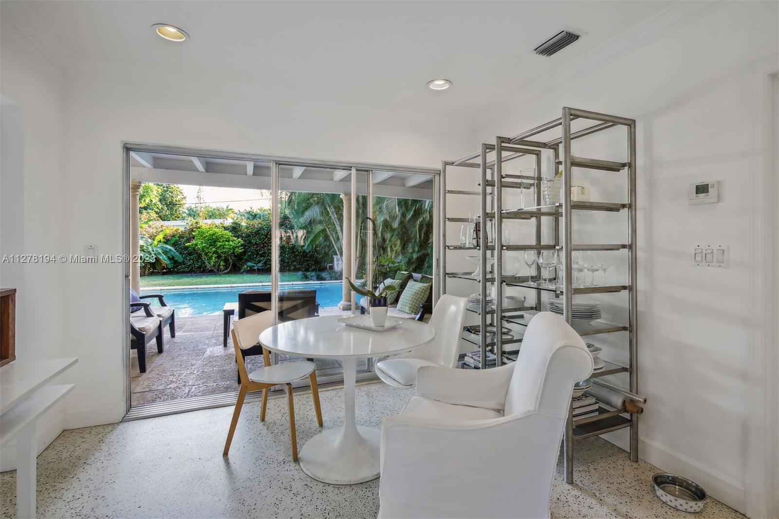 Overlooking the Pool and back yard.