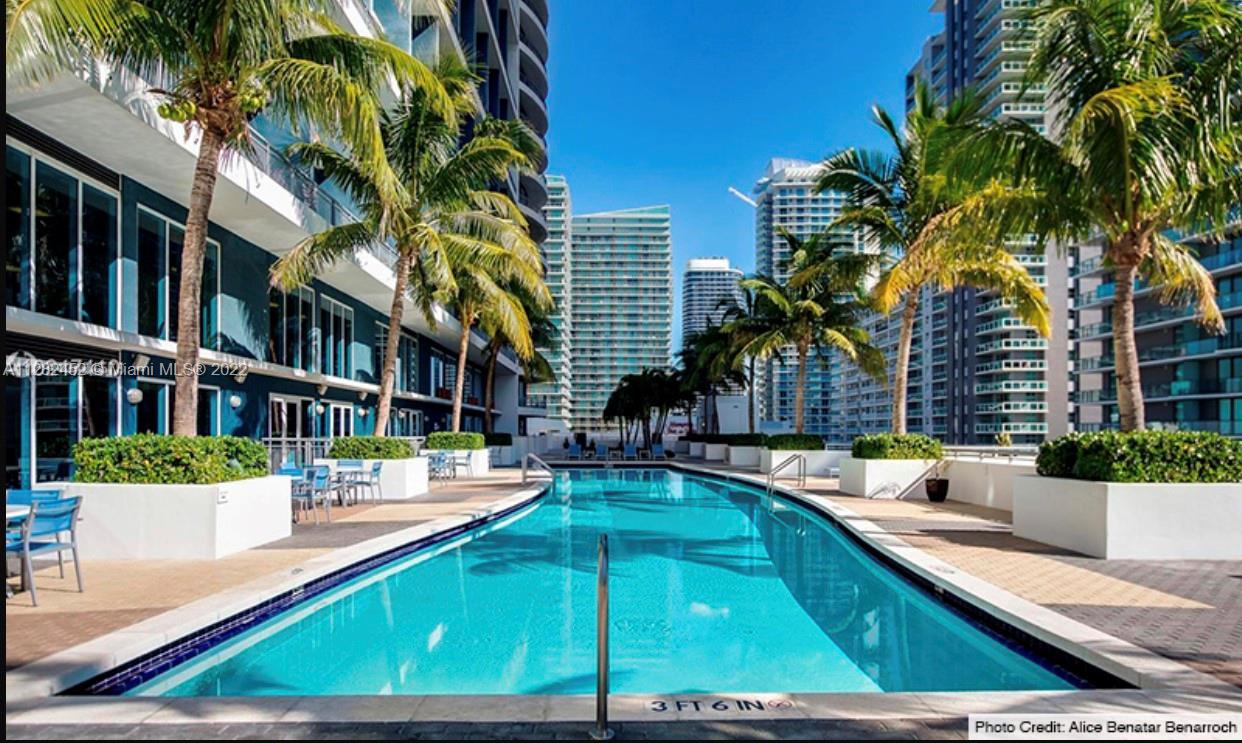 Loft style at Infinity at Brickell 1 bed 1.5 baths double high ceilings with balcony, 1 parking spot, kitchen with steel appliances, blinds, walking closet, 24 hrs concierge and security, Vallet parking, pool, jacuzzi, fitness center, sauna, business center and  near of Brickell city center and Mary Brickell village, easy in-out to 1-95. 30 days minimum stays. Easy to show it