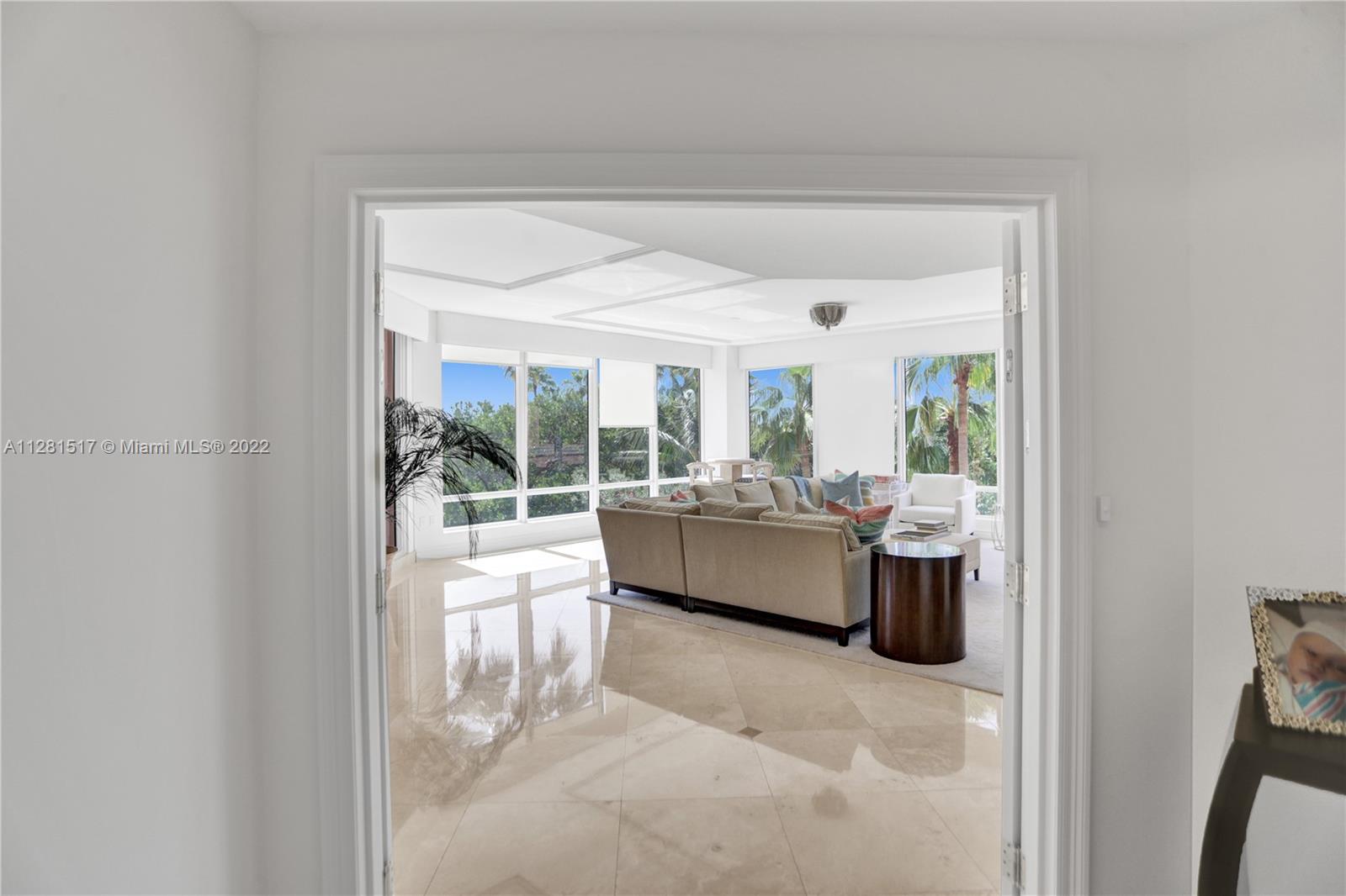 Rarely available A line (4530 SF) at THE GABLES CLUB.  Enter into a spacious living room and dining room overlooking lush landscaping and tranquil canal views from the SE corner of the building.  An outstanding floorplan with a separate family room plus 4 bedrooms/ 4.5 bathrooms.  All bedrooms are oversized with a master suite plus sitting area and an elegant bathroom.  Gourmet kitchen with eat-in area, marble floors, a 5 Star building with 24 hr. security, restaurant with delivery services, spa, tennis cts, heated pool + lap pool, fitness rooms, putting green.
A garage is available, should the buyer be interested, for $450,000 from a different owner.