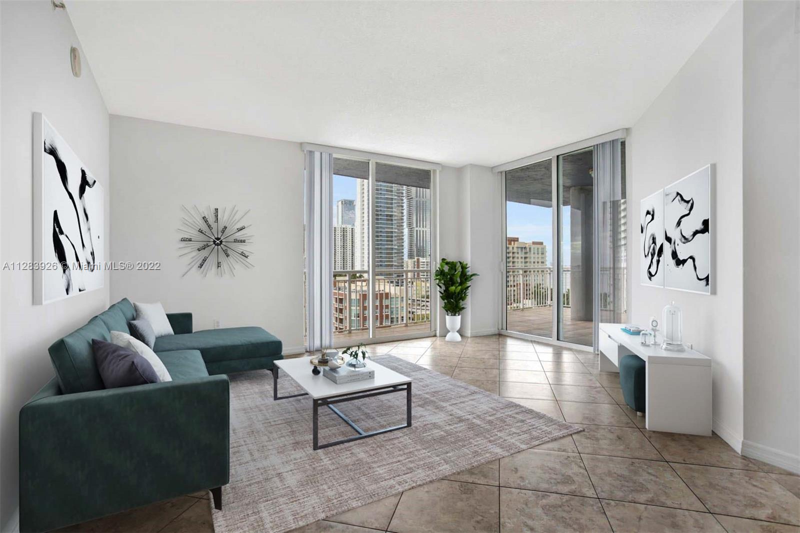 Large three-bedroom corner unit with a lot of natural light. It features a wraparound balcony with dramatic city and bay views both stunning during the day & night. The large balcony is perfect for indoor outdoor living to enjoy meals, views & a breeze! Great location near Downtown, Brickell, Wynwood, Design District and 10 min from the airport & beach. Walking distance to Publix, park, many restaurants and coffee shops. Building has 24-hour security, concierge, gym, pool, jacuzzi, and more! Two assigned tandem parking spaces. Washer and dryer in unit!