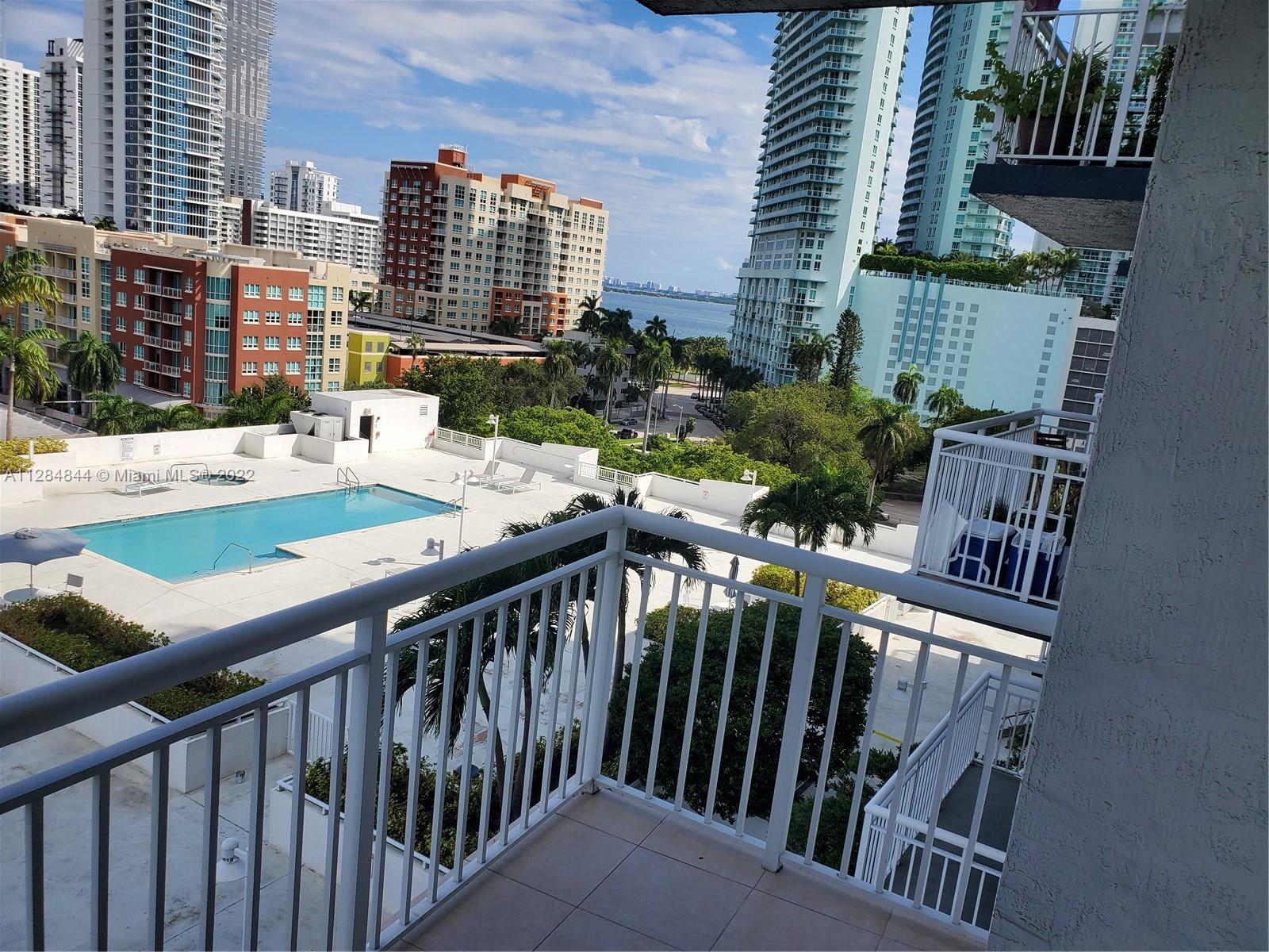 Unit is in the heart of Edgewater off of Biscayne Blvd with NE 18 ST. There are wood floors throughout, a BIG balcony with Northeast views of the pool deck, Biscayne Bay, and the city. Washer/dryer within. Rent includes basic WiFi. ONE ASSIGNED PARKING SPACE. Apartment is vacant and deep cleaned. It is walking distance to Publix, the Shops at Midtown, Wynwood, and the waterfront Margaret Pace Park. It is also a quick drive from Miami Airport and I-95. Building currently undergoing pool deck renovation for one year and routine exterior restoration and is priced with this consideration.