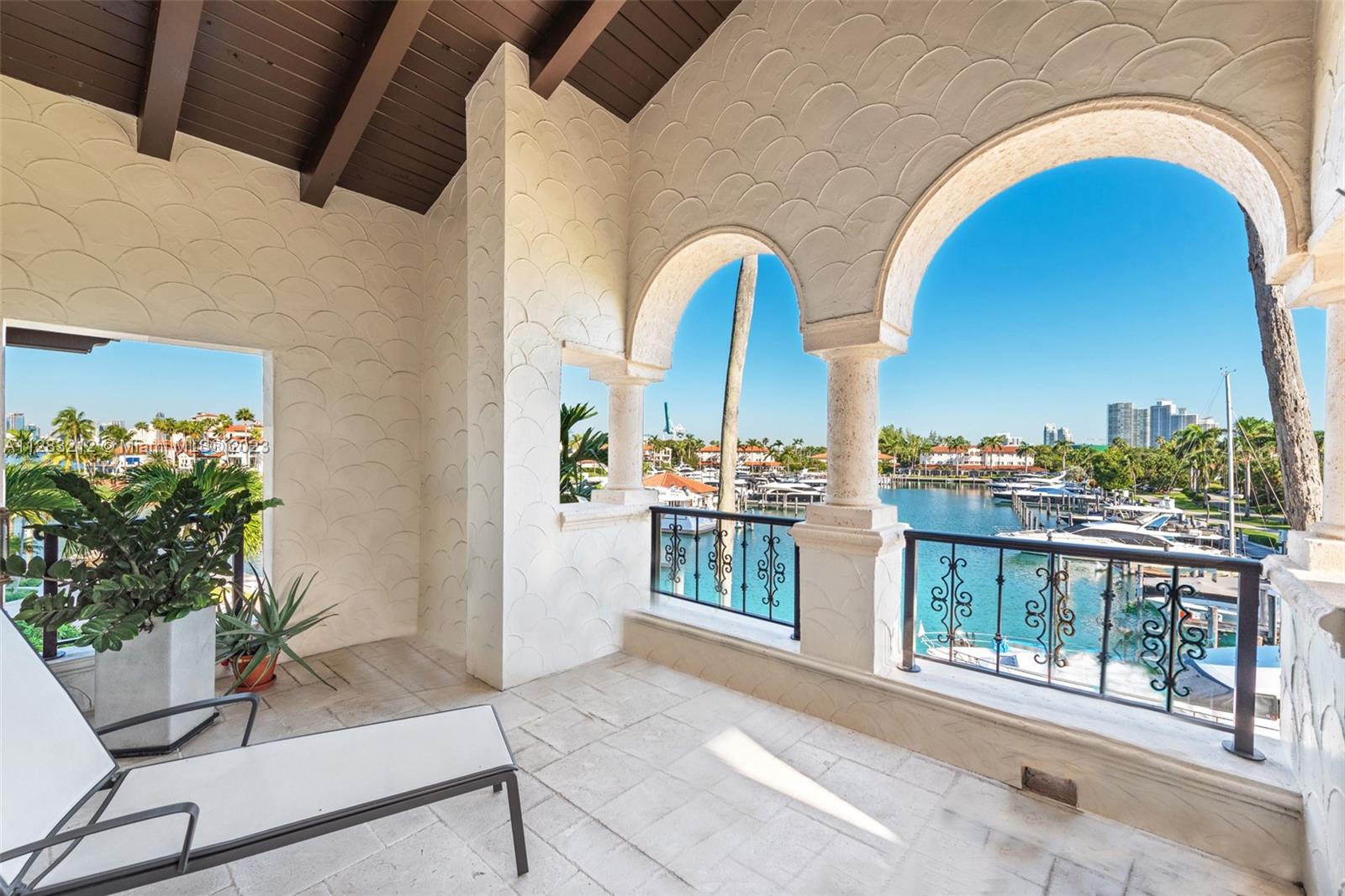 LIVE THE FISHER ISLAND LIFESTYLE IN THIS STUNNING BAYSIDE VILLAGE CONDO COMPLETELY RENOVATED WITH TOP-OF-THE-LINE FINISHES. FEATURES INCLUDE: 3 BEDROOMS , 3.5 BATHS, 2,744 SQ FT INTERIOR, STATE OF THE ART KITCHEN, MARBLE FLOORS THROUGHOUT, WOOD WALL PANELS, IMPACT GLASS DOORS, VAULTED CEILINGS IN THE PRINCIPAL BEDROOM AND ONE OF THE GUEST BEDROOMS, AUTOMATED WINDOW TREATMENTS, CORNER UNIT WITH WARP AROUND TERRACES OVERLOOKING THE FISHER ISLAND MARINA, GOLF COURSE AND MIAMI BEACH PERFECT FOR ENTERTAINING! VISIT THIS EXCEPTIONAL OFFERING!