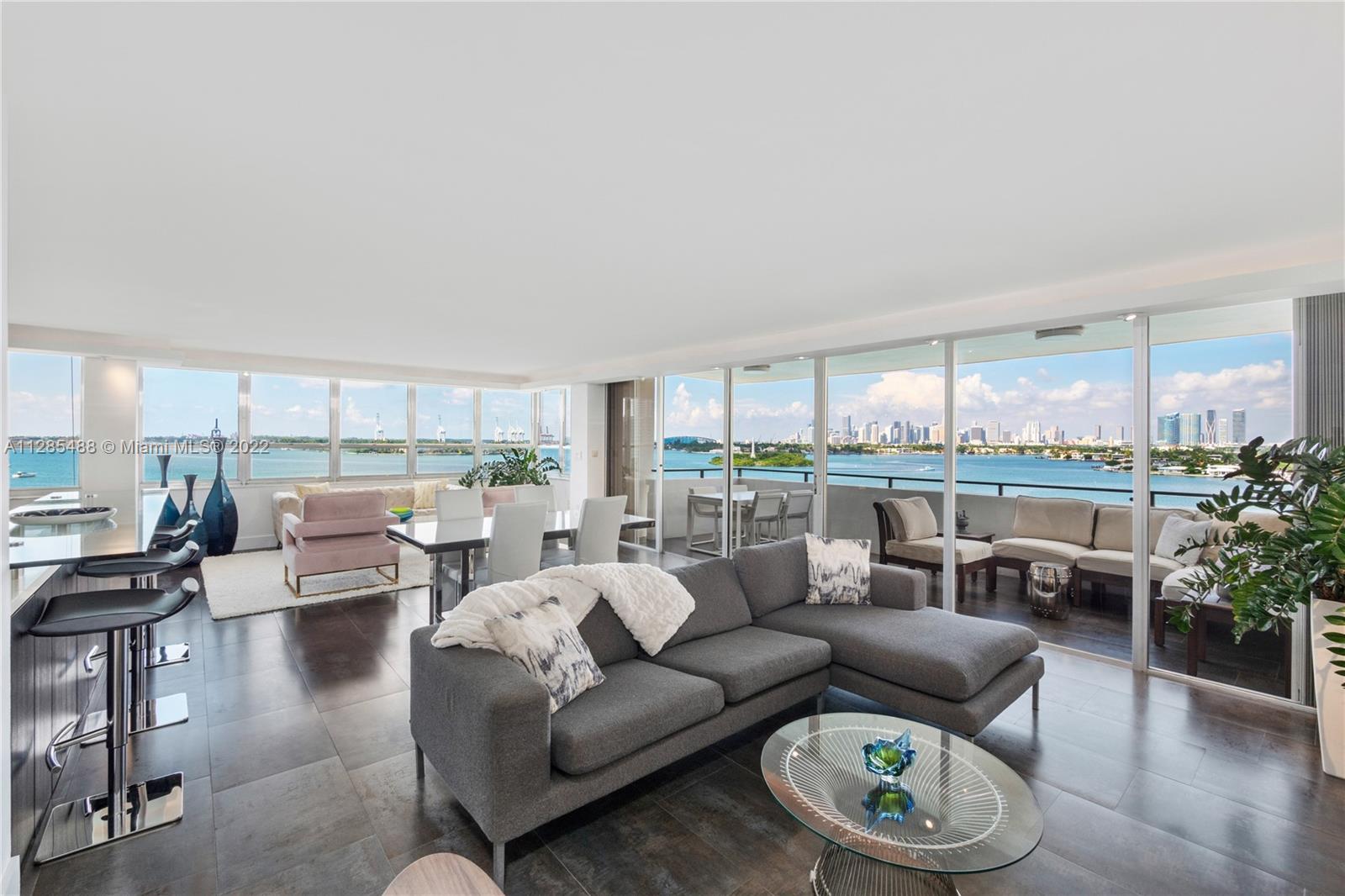 Located in the heart of Belle Isle, this spacious oasis boasts breathtaking open bay and downtown Miami views. This rarely available "01" line offers expansive water and skyline views from every room. The open kitchen and bar seamlessly flow into the oversized living and dining room. The Master and Jr. Master suites, both offer walk in closets and generous double vanity bathrooms. One of the few units in the building to offer a washer and dryer in the residence. A short walk to great dining, multiple grocery stores, world class fitness and all that the highly coveted neighborhood of Sunset Harbour has to offer.