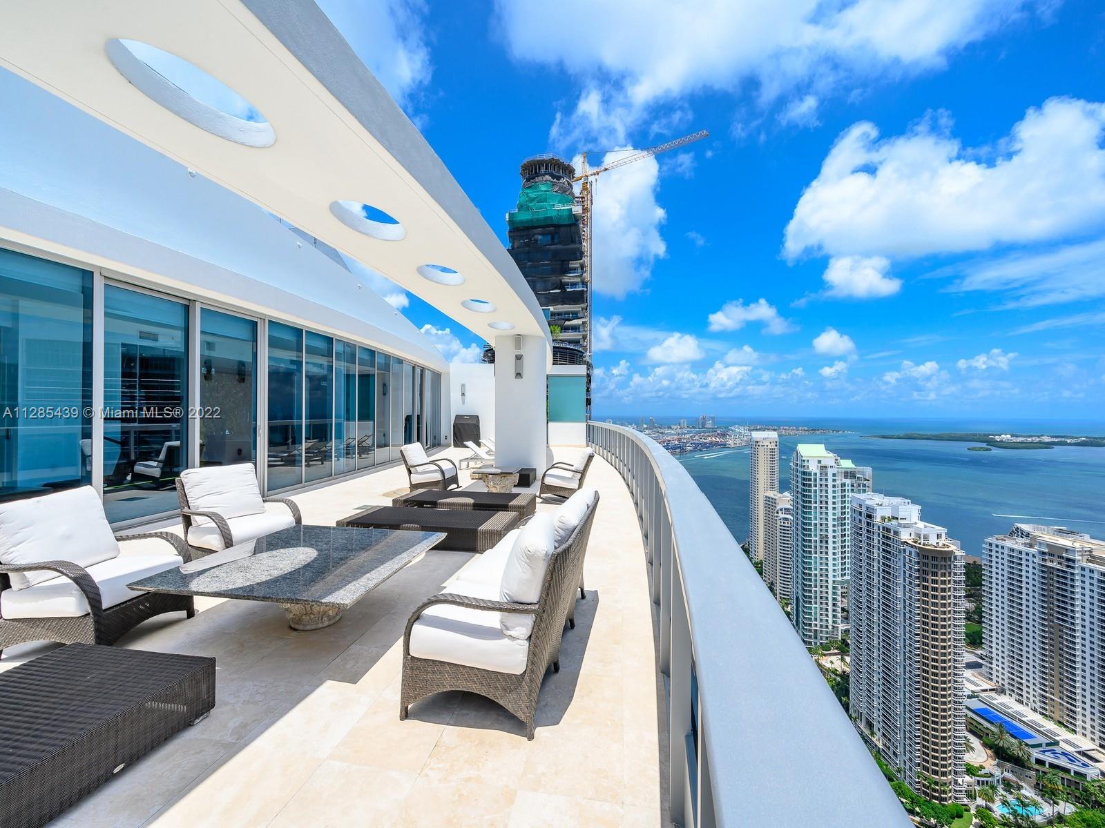 ONE OF A KIND PENTHOUSE unit w an expansive terrace featuring private jacuzzi, interior elevator & spectacular unobstructed expansive views.Marble floors throughout the living spaces & carpeting in the bedrooms.All bedrooms are en suite.Kitchen is fully equipped w Miele appliances, 2 wall ovens, 2 dishwashers, built in coffee maker, Sub Zero refrigerator & freezer & marble countertops.Large master suite offers 2 master closets + a linen closet.Full surround sound system & smart system.2nd floor features a bar area w ice maker, dishwasher & a 500 bottle wine cellar.Service quarters includes laundry room. This unit has 4 assigned parking spaces. The Epic is a full service building w heated pools, state of the art gym, bar, meeting and children rooms, restaurants, 24 hours security&concierge.