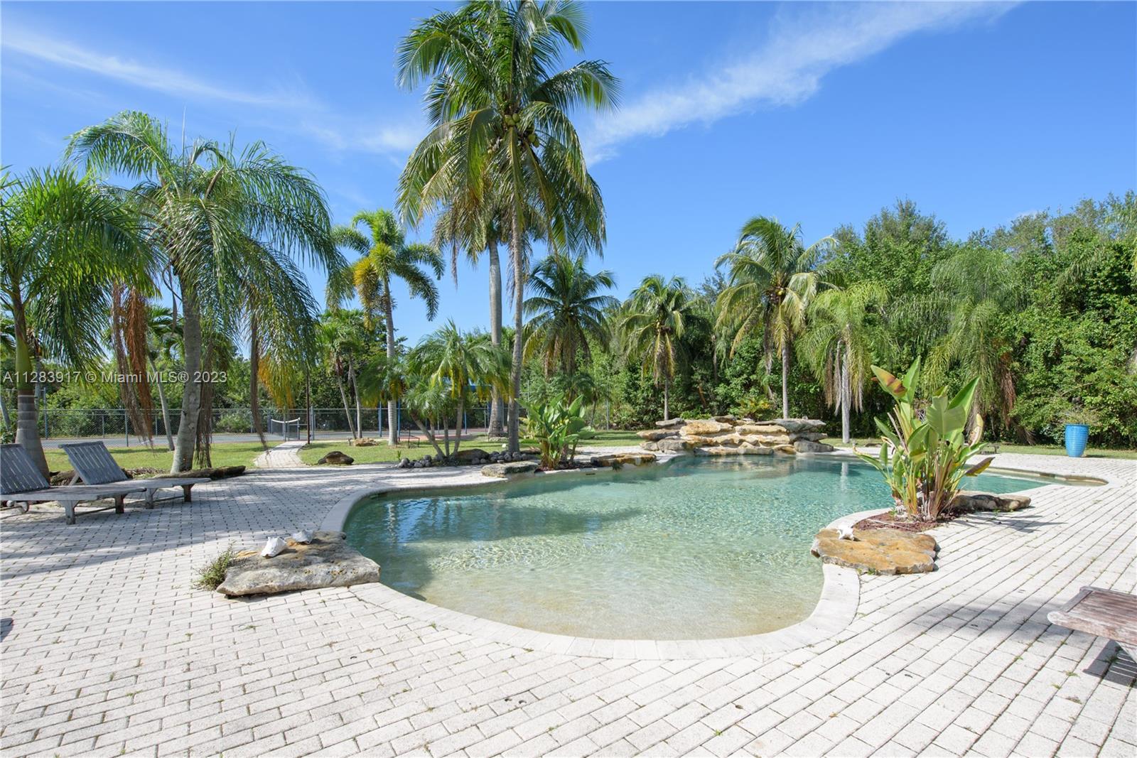 Lagoon style heated pool with beach like entry!