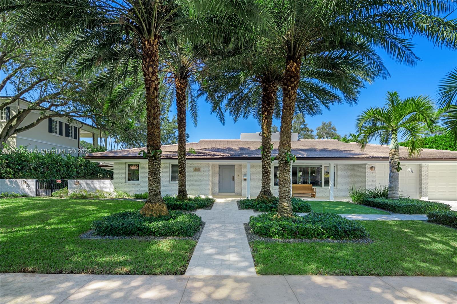 Situated on one of the most gorgeous streets in the original George Merrick Pioneer Village. Perfectly positioned on the 15th hole of the Riviera Golf Course with breathtaking views. The 2016 home remodel included replacement of roof, electric, plumbing, and all interior and exterior finishes. Open concept floor plan with living and dining room, cohesive to family room and kitchen area features pre-wired Sonos sound system, gas fireplace and high ceilings – prime for entertaining family and friends. Stunning views from your backyard terrace is complete with plenty of space for lounging and hanging out by the heated salt-water pool. Built-in Summer kitchen with barbecue, ice maker and beverage refrigerator. This is a fabulous opportunity to own a house on the coveted Santa Maria Street.
