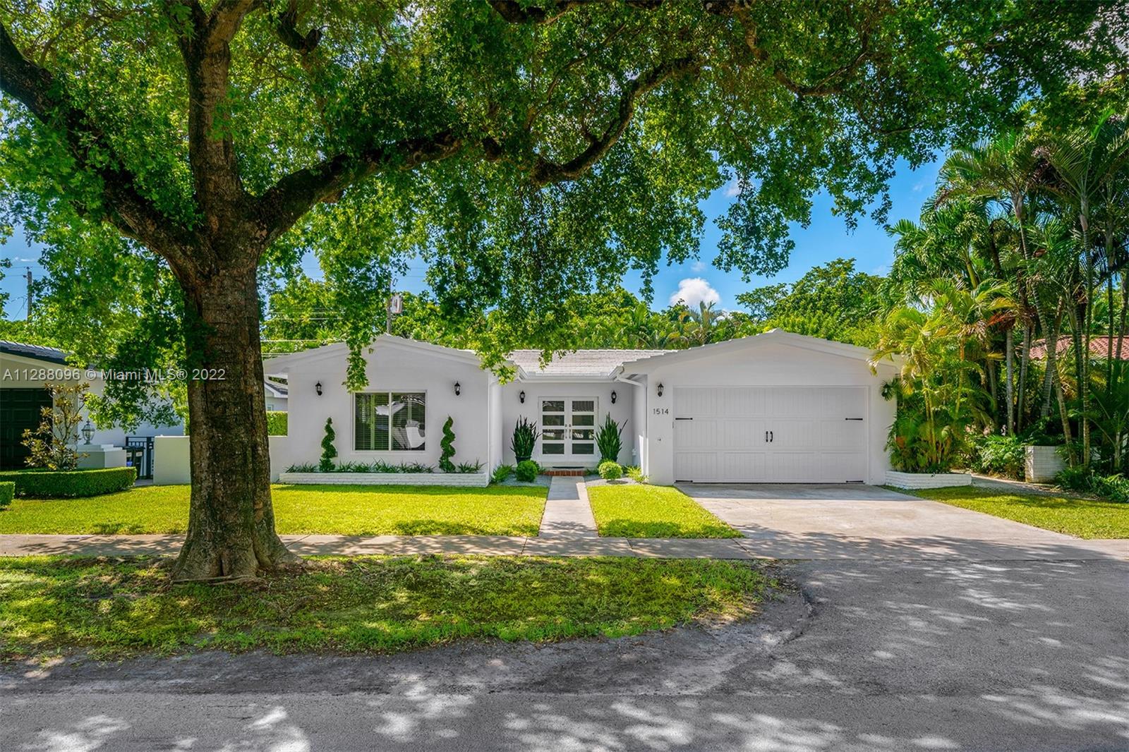 Immaculately presented and recently renovated 2,967 Sq. Ft. home with 3 bedrooms and 2 bathrooms, offering privacy and serenity. The light-filled and spacious floor plan highlights beautiful living areas, with every detail thoughtfully attended to. A formal dining area with wood floors is adjacent to the gourmet kitchen. Featuring a quartz eat-in peninsula island and new stainless-steel appliances, the kitchen flows effortlessly to a comfortable den area. The principal bedroom has an ensuite bathroom and spacious closet. Other features include custom designer light fixtures throughout, French doors, plantation shutters, artificial grass, and a 2-car garage with carriage-house style doors. Great location close to schools, universities, hospitals, shops, and restaurants.