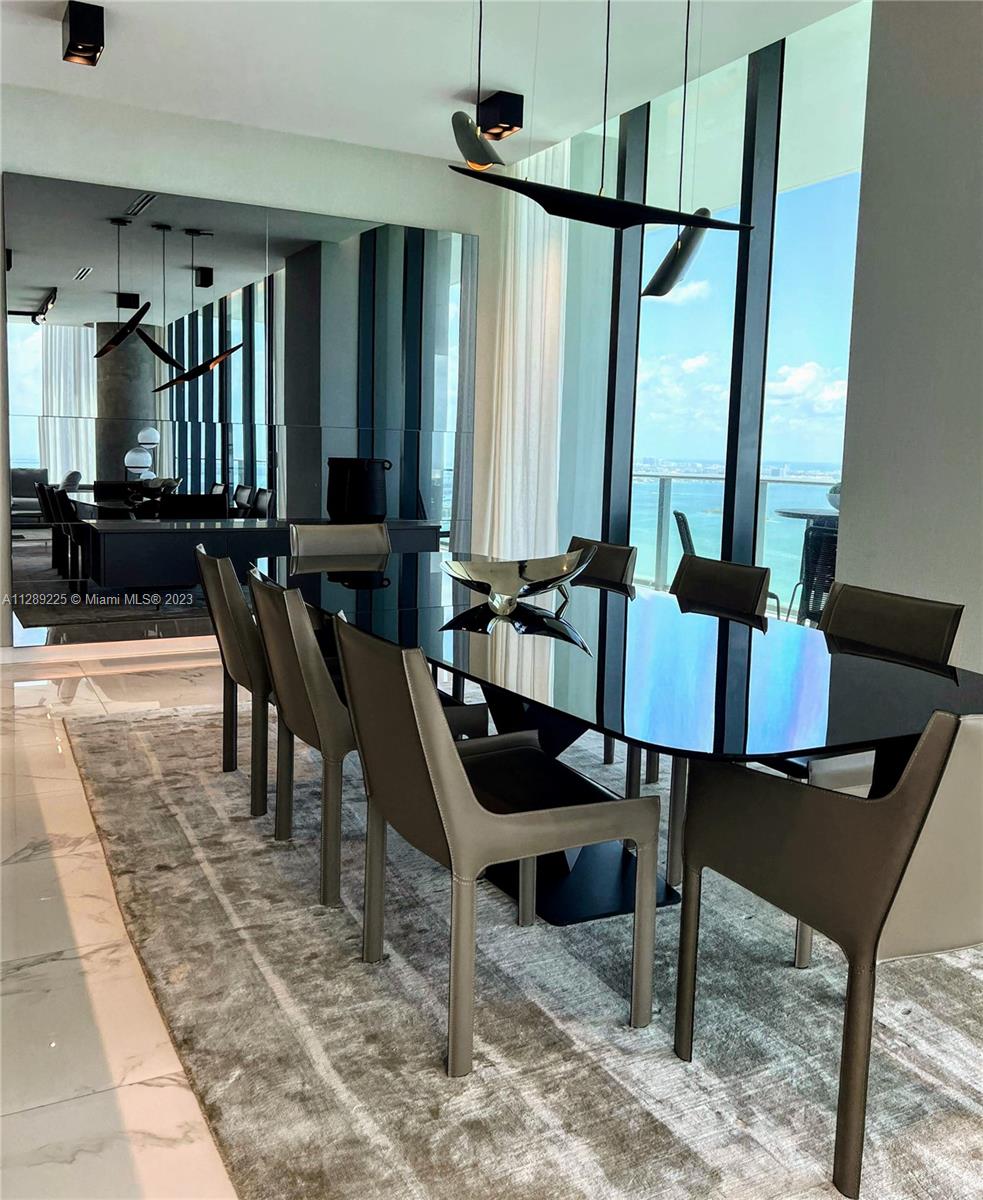 Italian Infinity glass & leather dining set