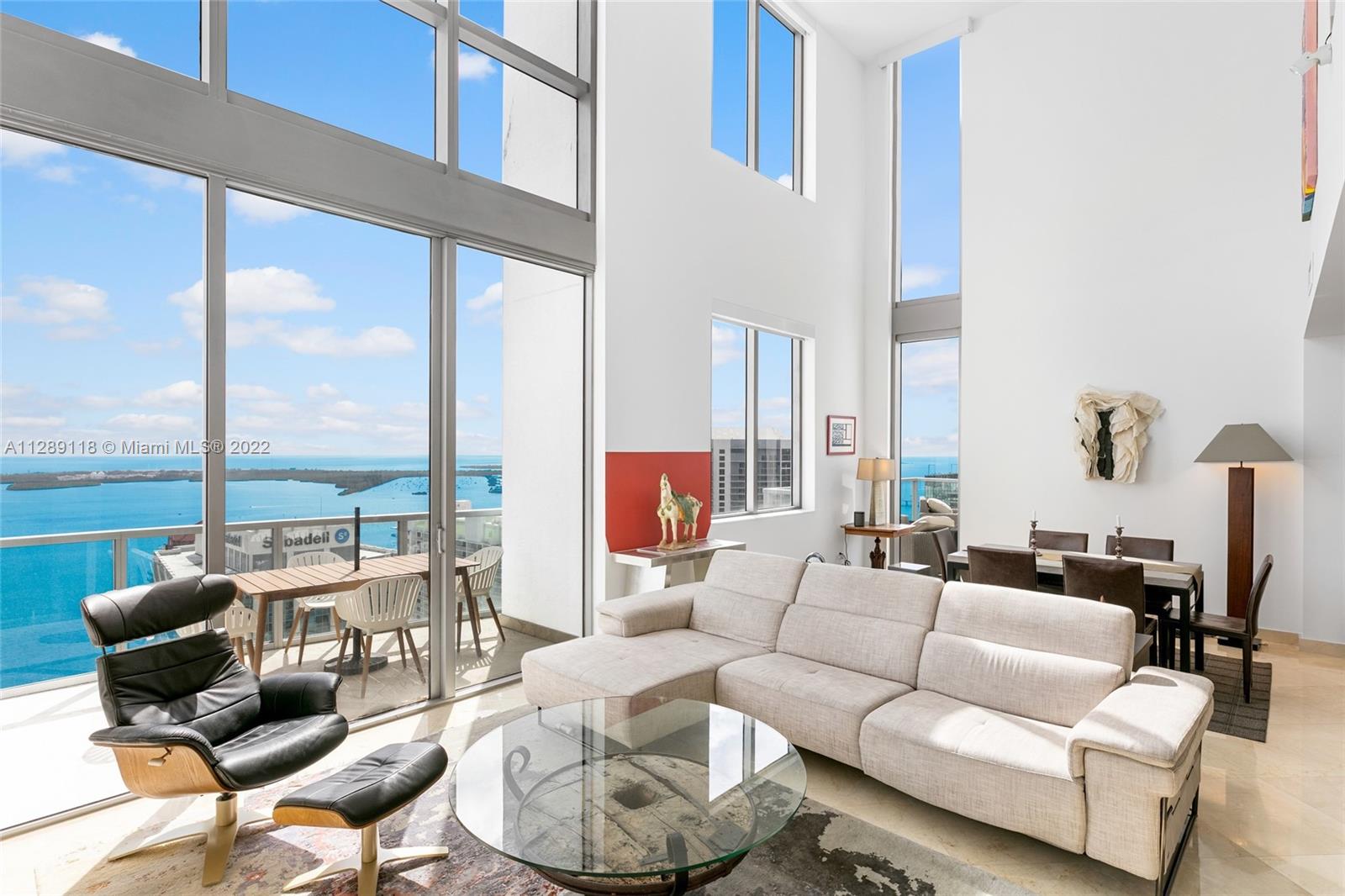 This incredible penthouse, rarely available for sale, boasts 15 foot ceilings on the 1st floor. this 3 bedroom 3.5 bath penthouse on 2 levels with 3 balconies and views that you can only appreciate in person. Valet parking for guests, Pool , Gym , yoga room, business area, Billiards rooms and game room are just a few of the amenities this building has to offer. In the heart of Brickell walking distance to the best restaurants in town this is a must see. Contact me for easy showing requests.
