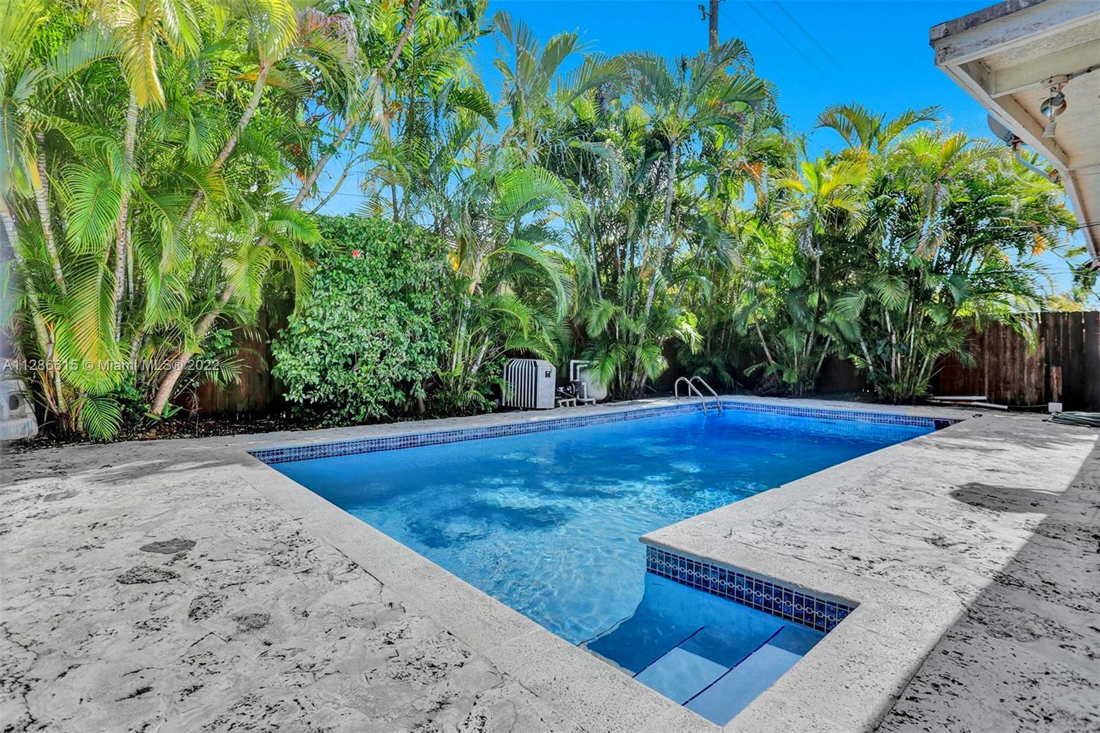 The pool Is 30’ x15’
Broken keystone patio floor inlaid with semiprecious gemstones, huge upgrade from the original.