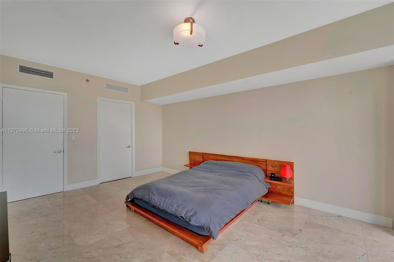 Spacious Bedroom with large custom walk-in closet