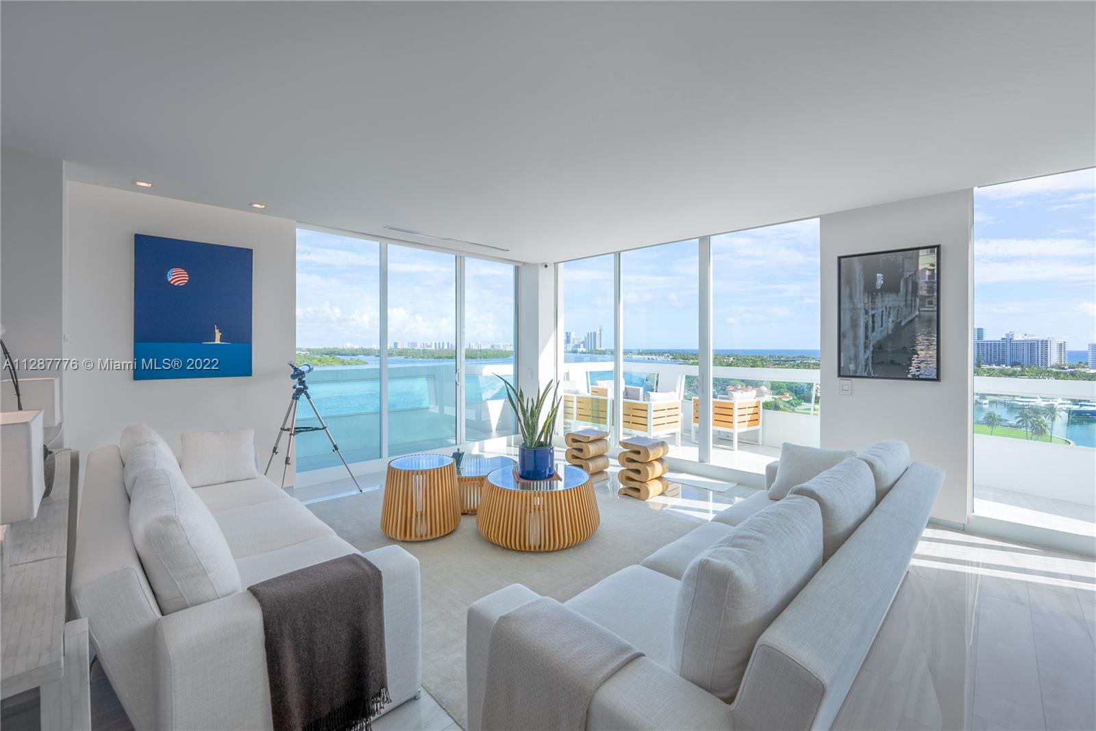Introducing this one-of-a-kind extravagant Penthouse situated in the twelve-story condo boutique building Le Nautique of the prestigious Bay Harbor Islands. Entering through the private foyer, this bright and spacious three-bedroom plus a den, three-and-a-half-bathroom residence boasts expansive ocean and bay views along with twelve-and-a-half-foot ceiling heights in the master bedroom. The European-style custom-made open kitchen features stainless steel appliances and designer finishes flow throughout. Magnificent Waterfront Home in the Sky is in close proximity to famous Bal Harbour shops and fine-dining restaurants. Become an owner of one of the twelve exquisite residences and transform your way of living in a secluded, safe, and one of the most desired neighborhoods.