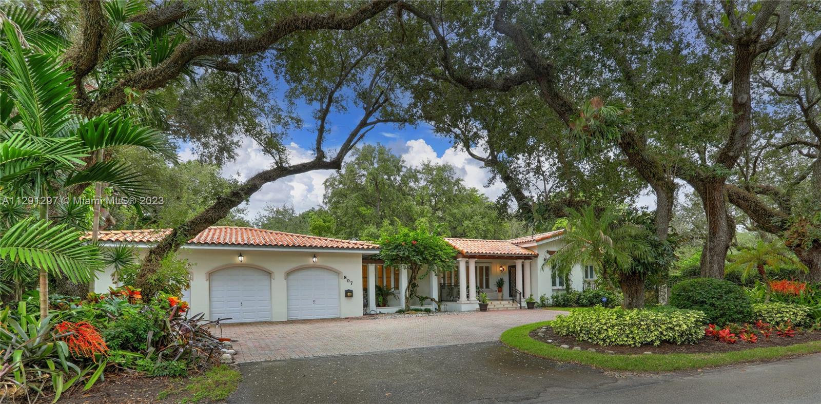 Located in the heart of Coral Gables, near Riviera Country Club, Merrick Park, & more, find this spacious 4,238 SF home on a magnificent 18,500 SF corner lot. The 4 BR, 3.5 BA, split plan home features gracious entertaining spaces including large formal living and dining rooms & wonderful family room that opens to the screened patio adjacent to the sparkling pool.  The vast kitchen features timeless & beautiful wood cabinetry, high-end appliances including a gas range & 2 ovens, & 2 eat-in areas.  The primary suite has 3 closets & a lovely bathroom w/ separate shower & tub w/ beautiful views of the lawn from windows on 2 sides.  Other features: 2+ car garage, laundry room, marble & wood floors, plantation shutters, & accordion & panel hurricane shutters.  Make this fabulous home your own!