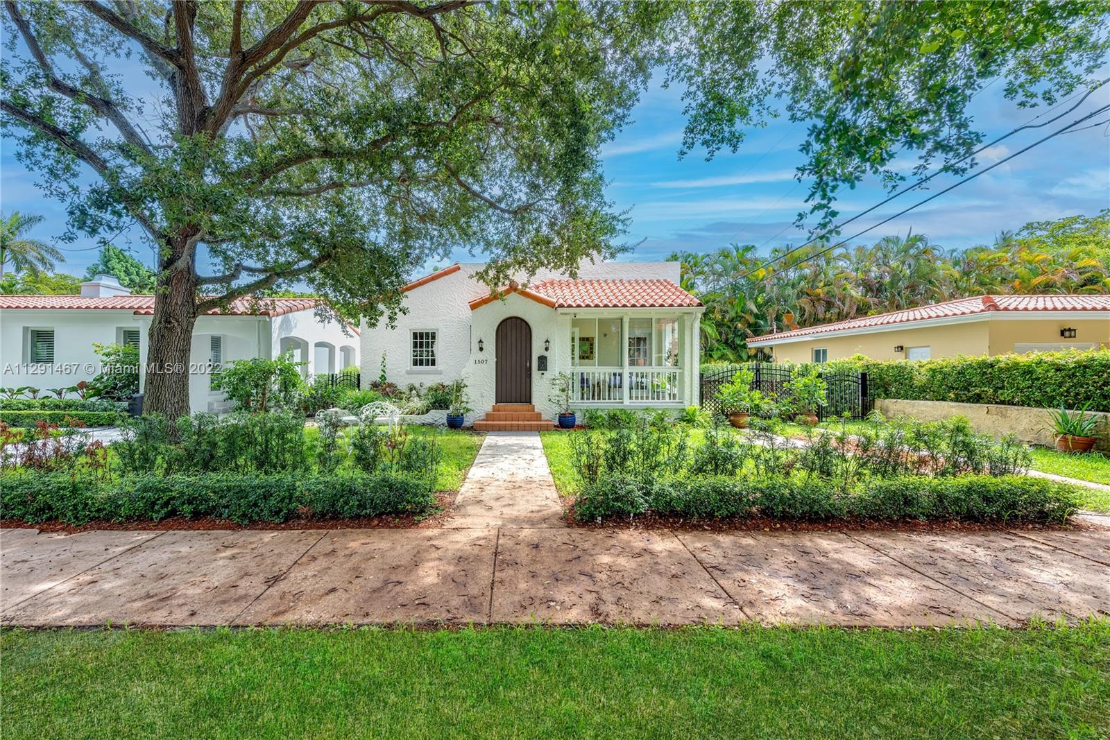 Charming 1920s home designed by George Fink, for the founder of Coral Gables' Merrick's development office. Recently updated, this gorgeous home features large rooms, 9½ ft ceilings & plenty of sunlight through newer impact windows/doors. New AC . Formal DR, Large eat-in kitchen has new appliances; granite counters. 4 bdrms/3 baths. Spacious master suite has 10-ft ceiling & updated bath w/double vanity & clawfoot soaking tub. Plantation shutters & crown moldings throughout, formal foyer & sunroom with original mosaic tiles, Wood-burning fireplace in living room.. Family room in rear. Garage converted to the 4th bedroom with en-suite bathroom. Home is larger than tax roll, expanded to nearly 2400 sf. This home is well priced/easy to show.