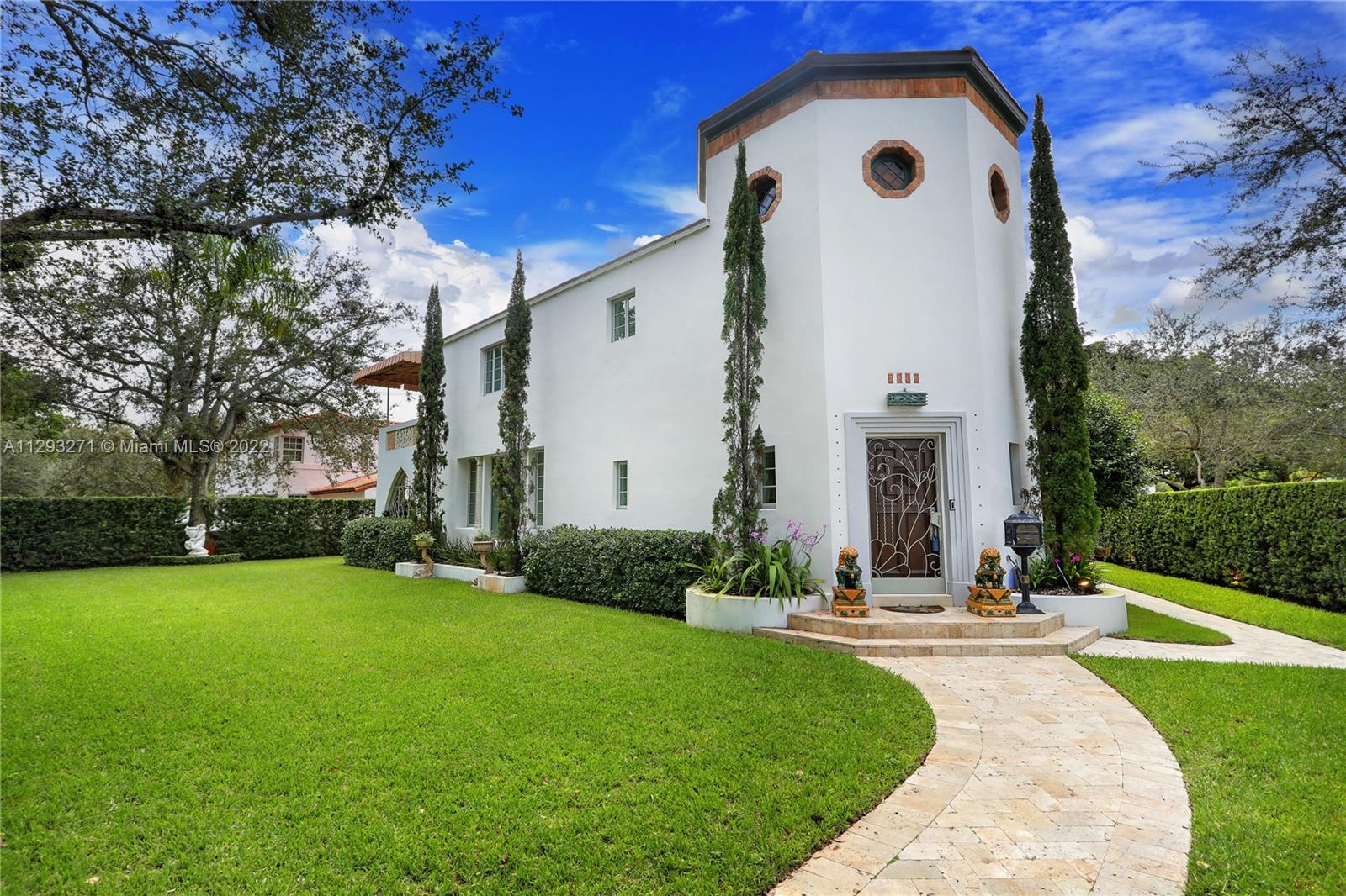 Overlooking the DeSoto Fountain, this iconic 4 BR/4.5 BA 1937 Art Deco showstopper marries classic architecture w/ modern upgrades.  The 2-story foyer entry has a sweeping staircase w/ original terrazzo & tile & sets the stage for this architectural gem.  To the left, find the large living rm w/ fireplace, windows/doors on 3 sides, & access to the covered porch w/ gorgeous ironwork. The spacious dining room sits adjacent to the fully-updated kitchen that has beautiful tile, center island, gas range, & double ovens.  The primary suite is upstairs & enjoys a private balcony, walk-in closet, & en-suite BA.  2 more BR’s w/ en-suite BA’s are also upstairs.   The 11,500 SF lot has room, & approved plans, for a pool & there are plans to expand the 2nd story.  Impact glass, generator, 2 car gar.