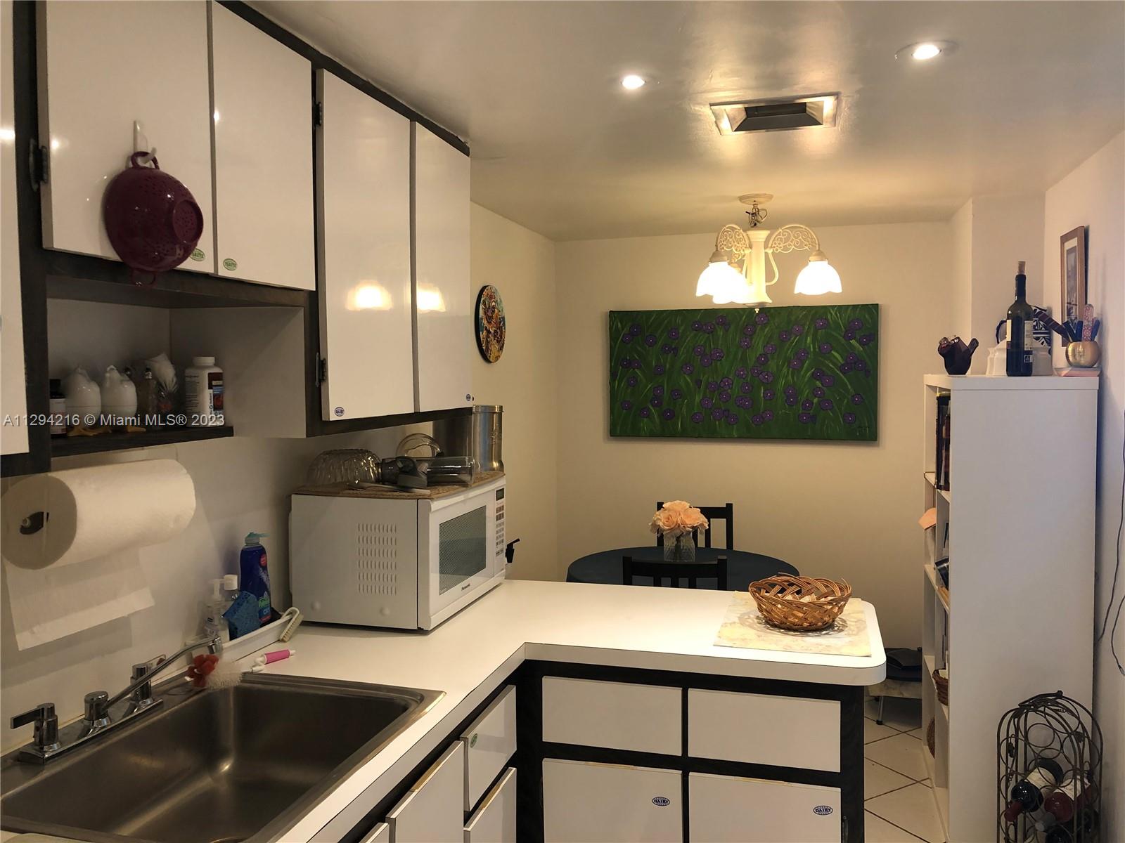 Kitchen after tenant moved in furniture :)