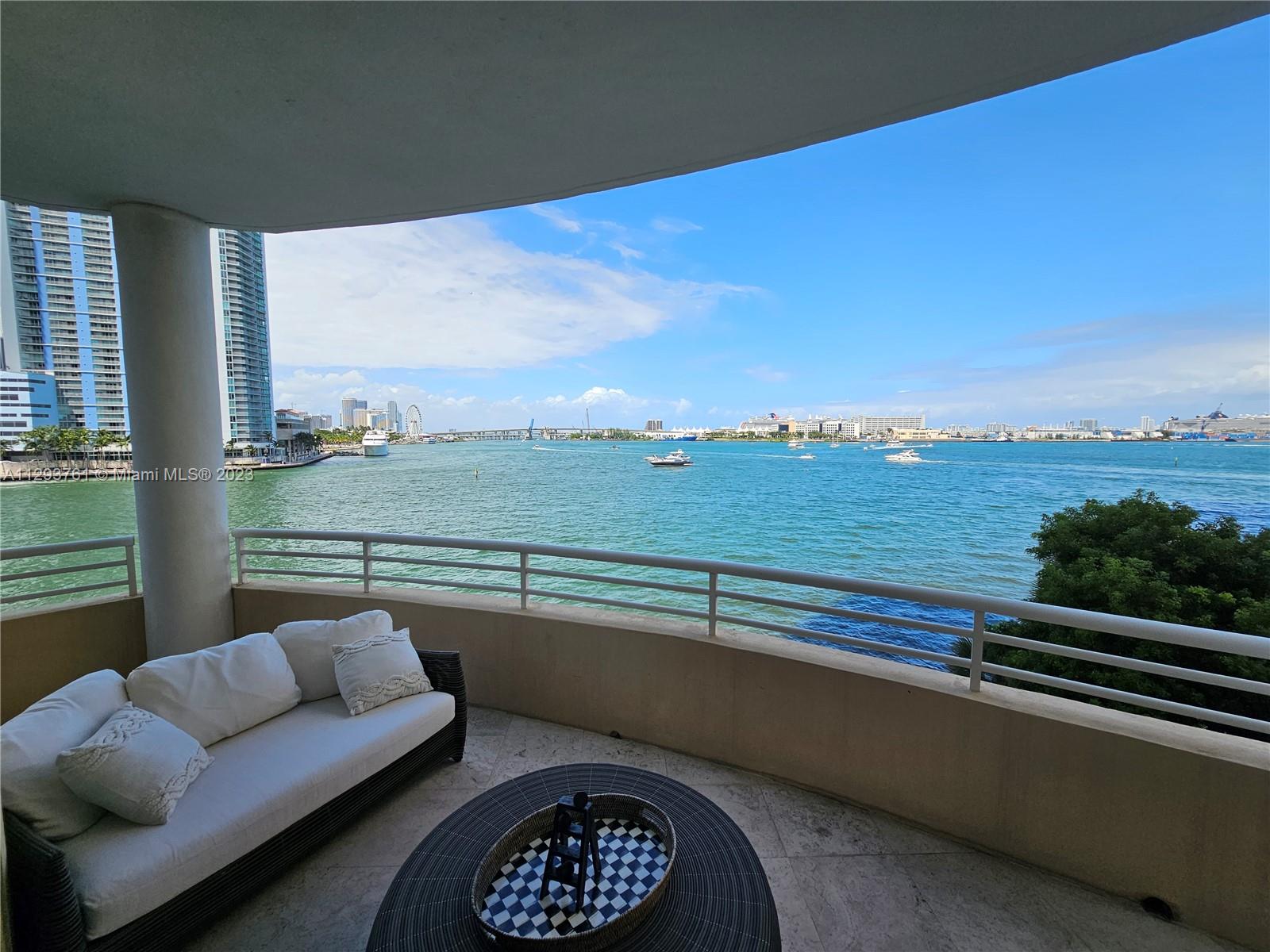 Unique condo in One Tequesta 2 units combined (4th floor) Best views in Brickell Key Island. This 4th floor NE facing gem has the perfect most amazing ocean views on the market, including to the Miami River, Biscayne Bay & the Downtown Miami skyline (adorable night & day views 4th floor cruise ship feel) Private end of hallway unit with 4 BR's (2 masters with balcony & walk-in closets) all  bedrooms have a full bathroom, plus there's a half bath for visitors. Large wrap-around balcony to enjoy the magnificent views while entertaining guests. The open, spacious very bright living area connects to a beautiful dining space & gourmet kitchen all with amazing views. storage units, High ceilings, best 2 parking spots on 4th floor. Enjoy a vibrant life steps away by the bay in Downtown Miami.