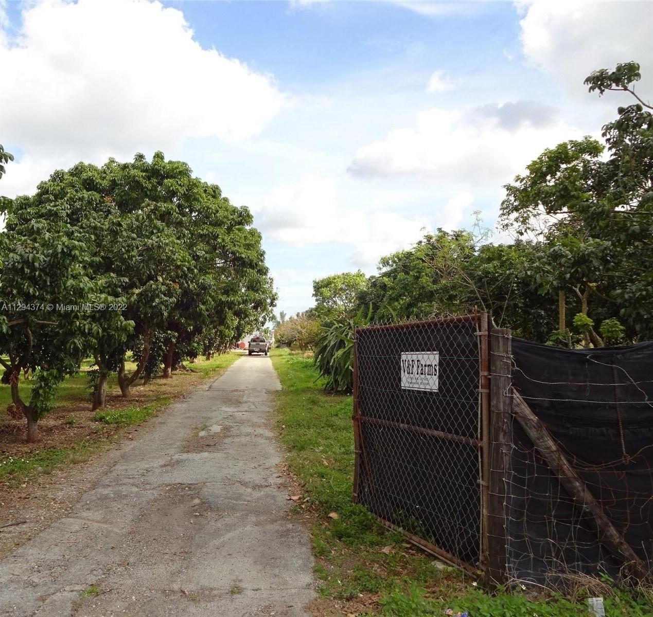 Will not last....2/1 home on more than 4 1/2 acres.  Property includes over 200 Longan trees, Dragon Fruit, Mamey, Mango, Guava, Avocado, Lychee, Sugar Apples, Jack Fruit, Bananas and much more.... You can also start with seedling in th horizontal Hydroponic Grow System. There is also a Tilapia Farm with its custom built aquaculture system. 

Please call Listing agent for showing instructions.