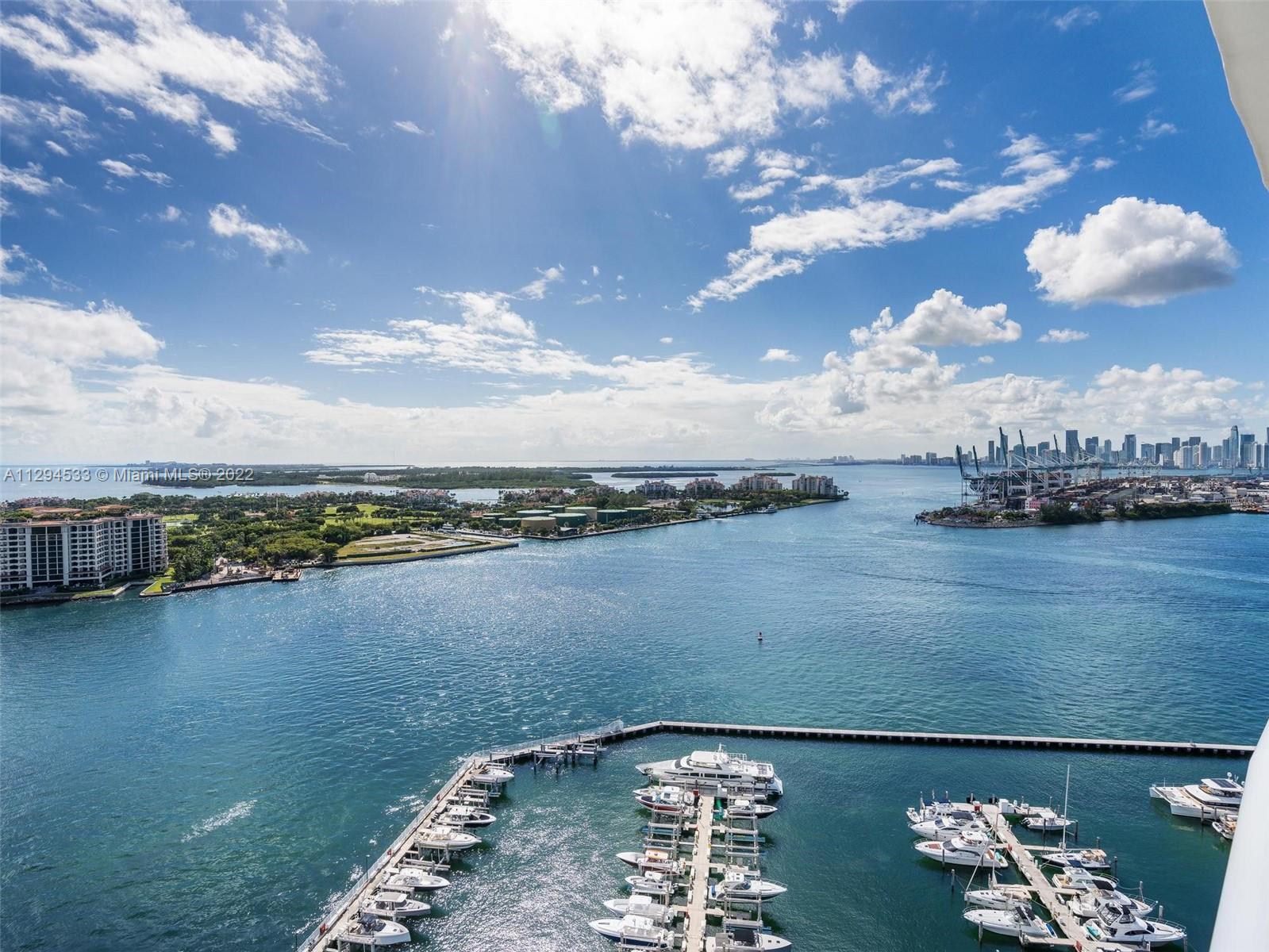 stunning  spacious unit with direct ocean and bay view featuring marble floors thought-out  the unit, stainless steel appliances , large balcony in exclusive Sofi neighborhood. High end amenities such  as private beach club, 2 pools, Tennis Court, Restaurant , Spa. Den can be used as an office or bedroom.