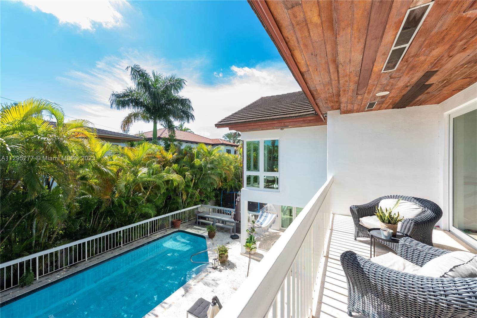 OPEN BALCONY FACING THE POOL