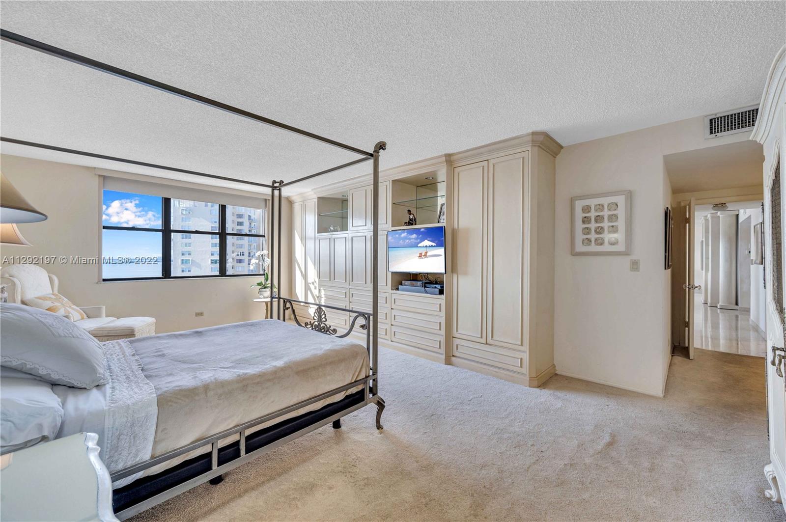 Main bedroom with built in cabinetry