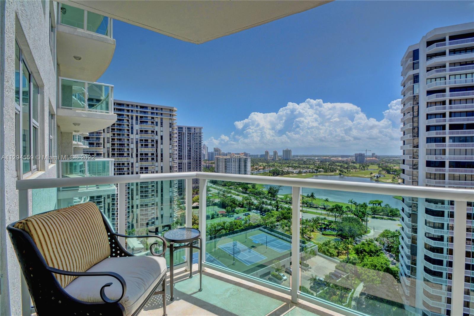 Master Bedroom Balcony with view to the Golf course and Tennis court