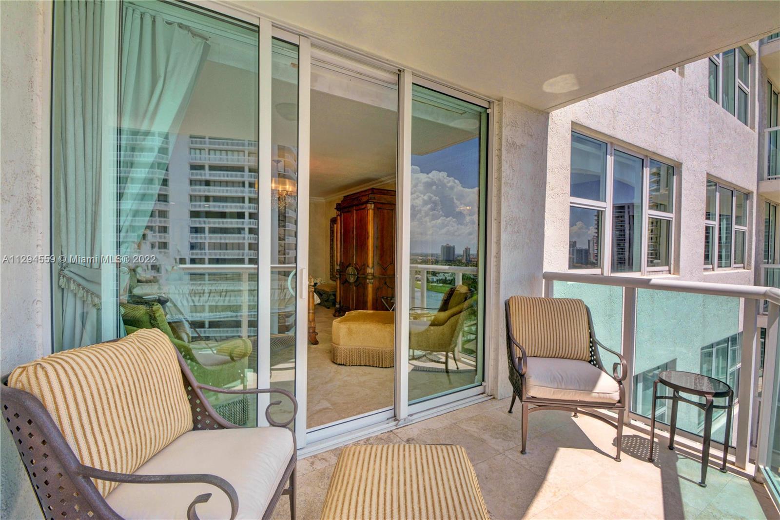 Master Bedroom Balcony with view to the Golf course and Tennis court