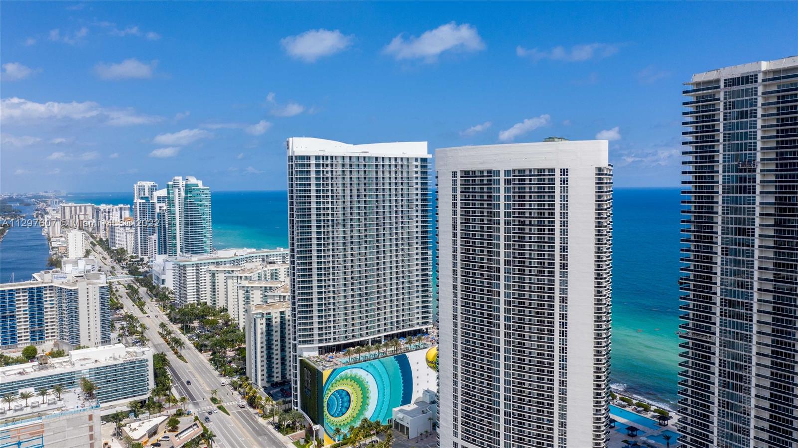 Breathtaking intracoastal and city views awaits you from this 2 Bed + Den/3 Baths. 1,571 Sq. Ft unit with a 177 Sq. Ft. Balcony. Italian Kitchen with KitchenAid appliances and granite counter-tops. Marble floors throughout. Located directly on the ocean, the building features a 50,000 sq. ft. full service spa & fitness center, restaurant, bar with pool service. 24 hr. valet parking and security. It includes a 9-acre site with over 900 ft. of ocean frontage.