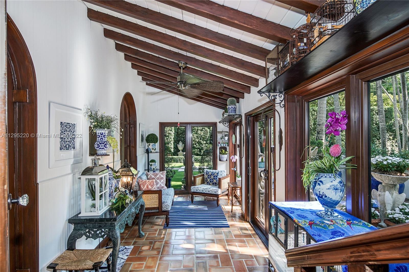 French Doors Open to Courtyard