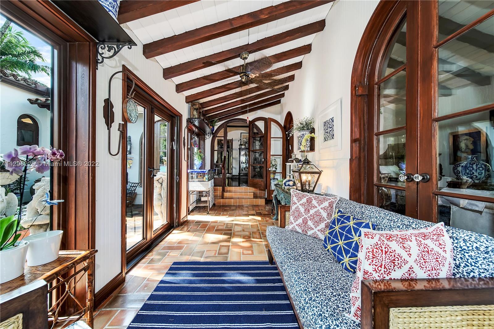 French Doors Open to Courtyard
