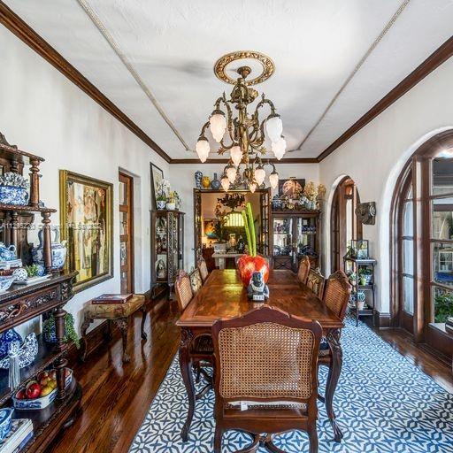 French Doors on the right open to a Courtyard