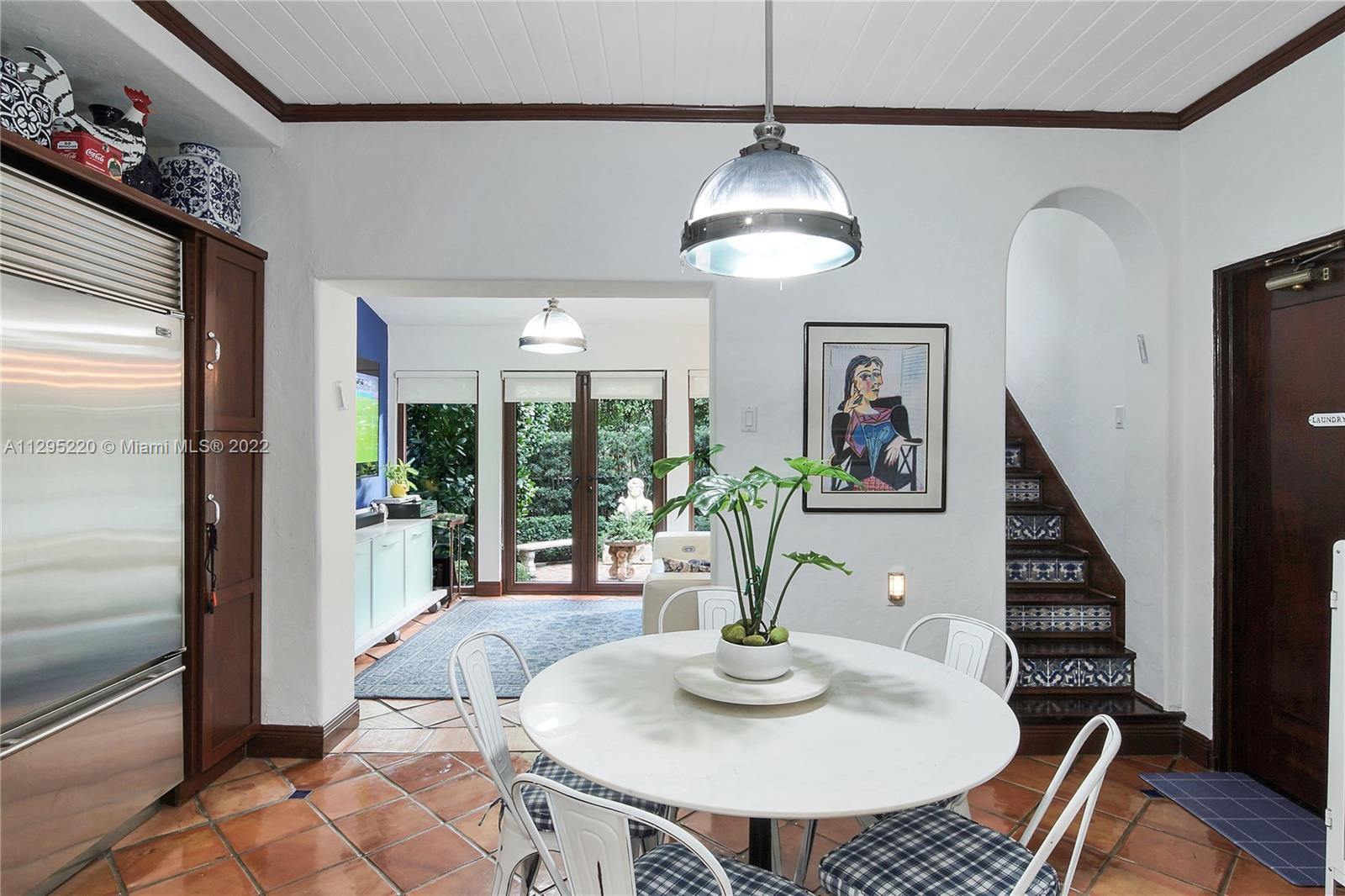 Breakfast Area with views to TV room. Rear Staircase seen on right.