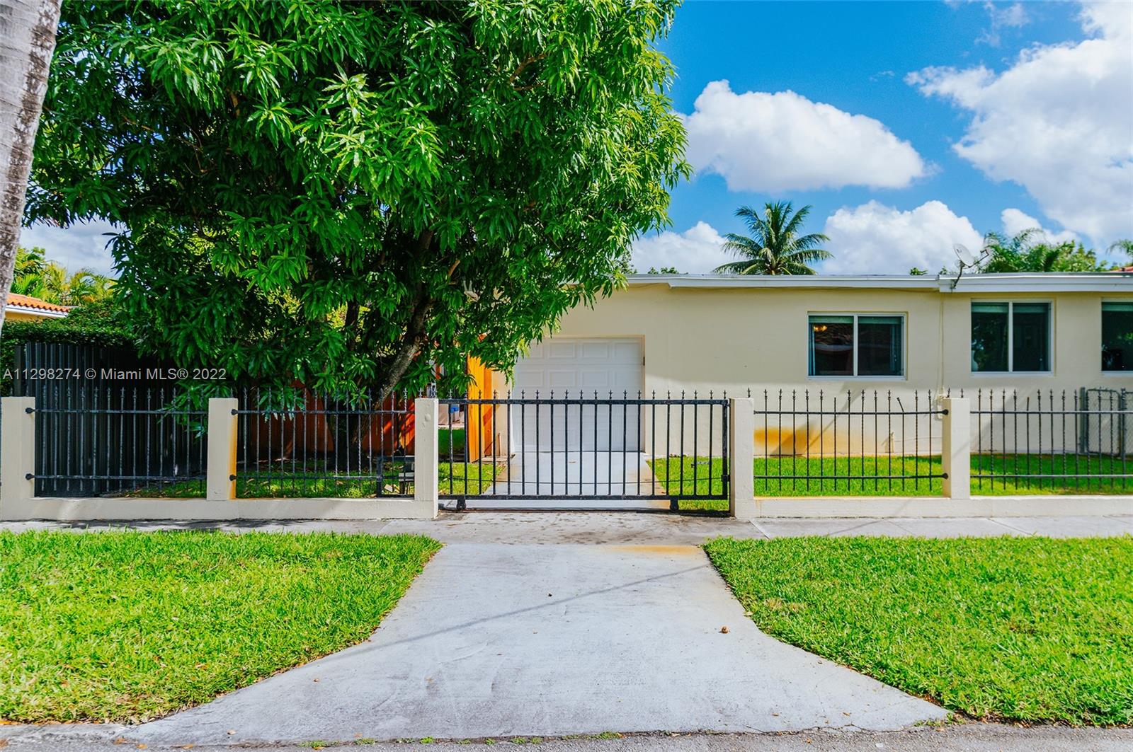 West Side of Home & Garage