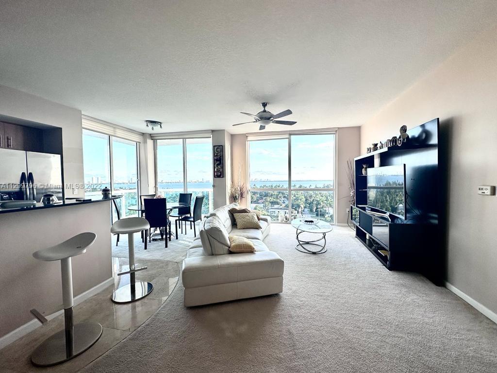 UNOBSTRUCTED VIEWS FROM GORGEOS CORNER UNIT. LUXURIOUS FINISHES. KITCHEN  WITH WOOD @ GRANITE, STAILESS STEEL APPLIANCES. IMPACT GLASS THROUGHOUT. LARGE, ELEGANT MASTER SUITE, MARBLE MASTER BATH  WITH JACUZZI, SHOWER & DUAL SINKS. MARINA AVAILABLE / 24 H CONCIERGE / VALET PARKING /EXCELLENT SECURITY / GATED ENTRANCE / GYM / 2 HEATED POOLS / SAUNA.