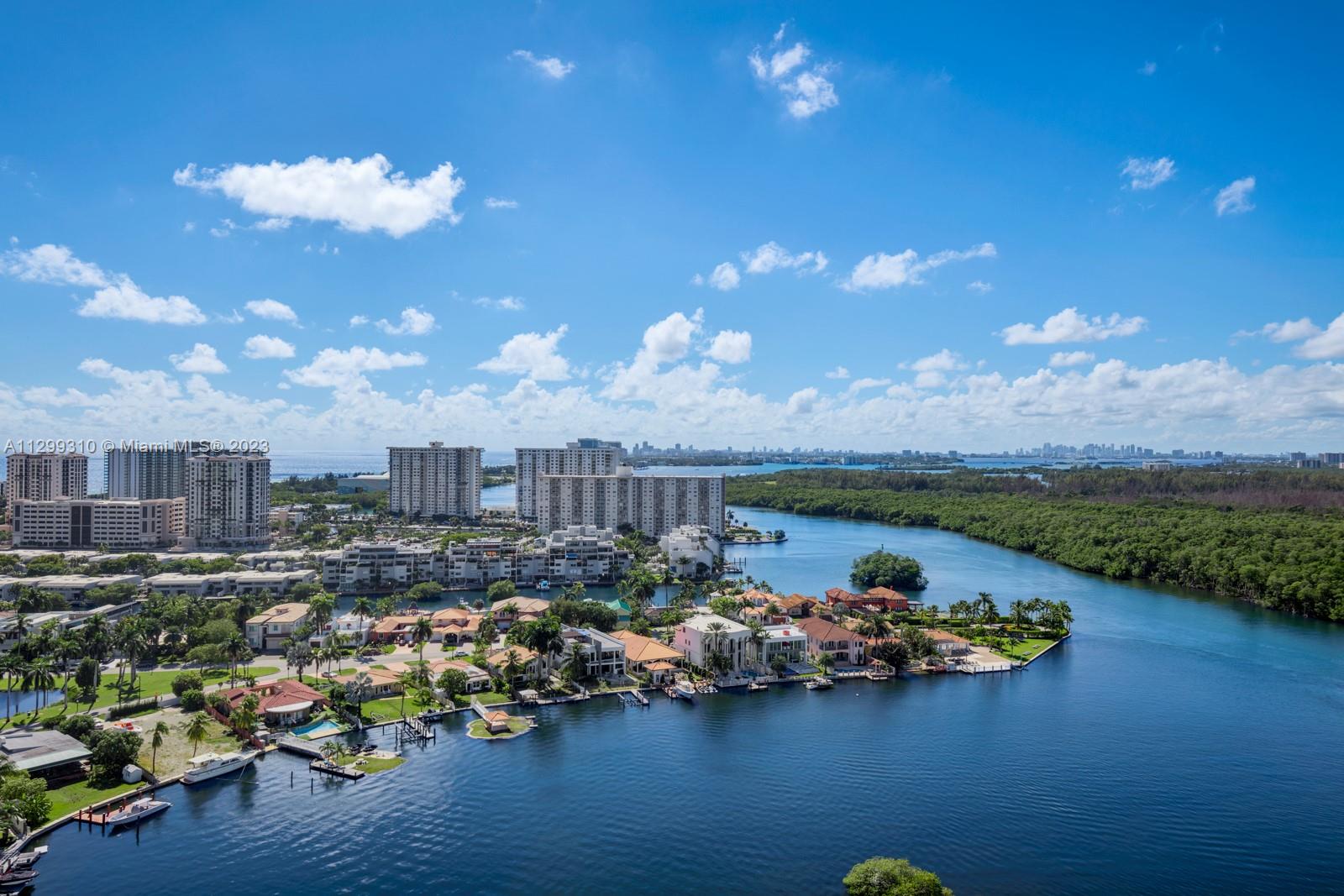 ONE OF A KIND UNIT, HIGH FLOOR, 2 BEDS + ENCLOSED DEN + 3 BATHS, 1553 SQFT UNDER AC + 317 SQFT OF OUTDOOR SPACE (LONGEST BALCONY IN THE BUILDING WITH BREATHTAKING VIEWS). A LOT OF UPGRADES! A TRULY UNIQUE LUXURY LIVING PROPERTY IN A RESORT STYLE BUILDING WITH GREAT AMENITIES (INFINITY LAP POOL, GIANT JACUZZI, CARDIO ROOM, SAUNA, STEAM ROOM, STATE OF THE ART GYM, BAR/GRILL RESTAURANT, TENNIS & PICKELBALL, SOCIAL ROOM AND MARINA! ALL THAT WALKING DISTANCE TO THE BEACH, CAFES, RESTAURANTS, SHOPPING. 5 MINS DRIVE TO BAL HARBOUR SHOPS AND AVENTURA MALL. 20 MINS DRIVE TO MIAMI INTERNATIONAL AND FORT LAUDERDALE AIRPORTS! A MUST SEE GEM IN SUNNY ISLES.
