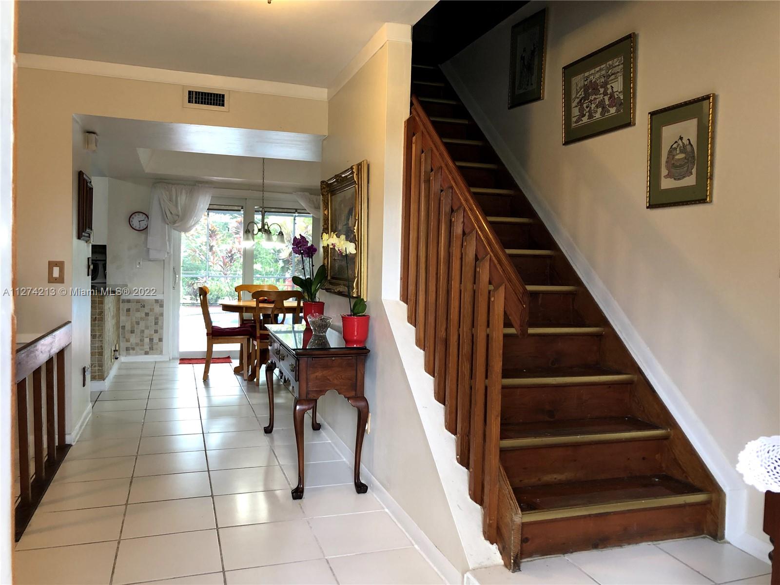 Staircase to Masterbedroom, Masterbath, bedroom#2, Bathroom with shower and tub, and Bedroom #3.