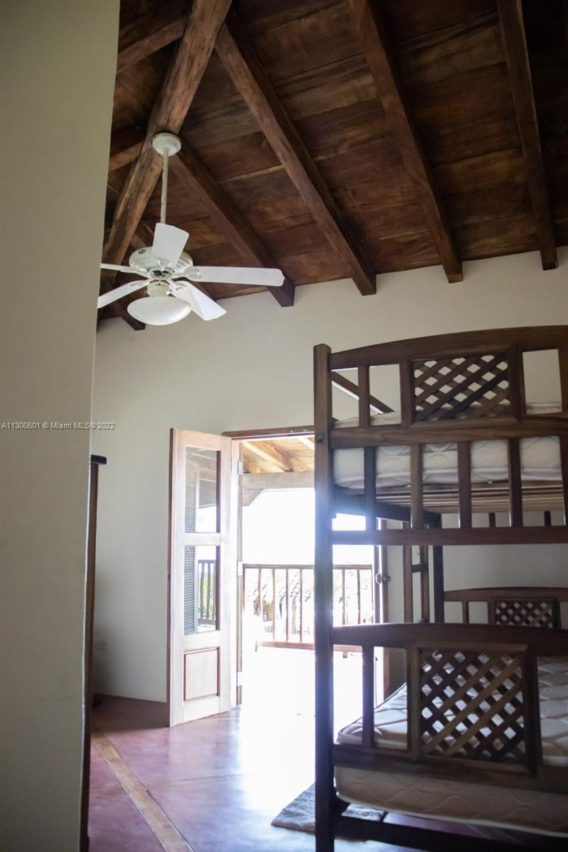 Second bedroom with beach view.