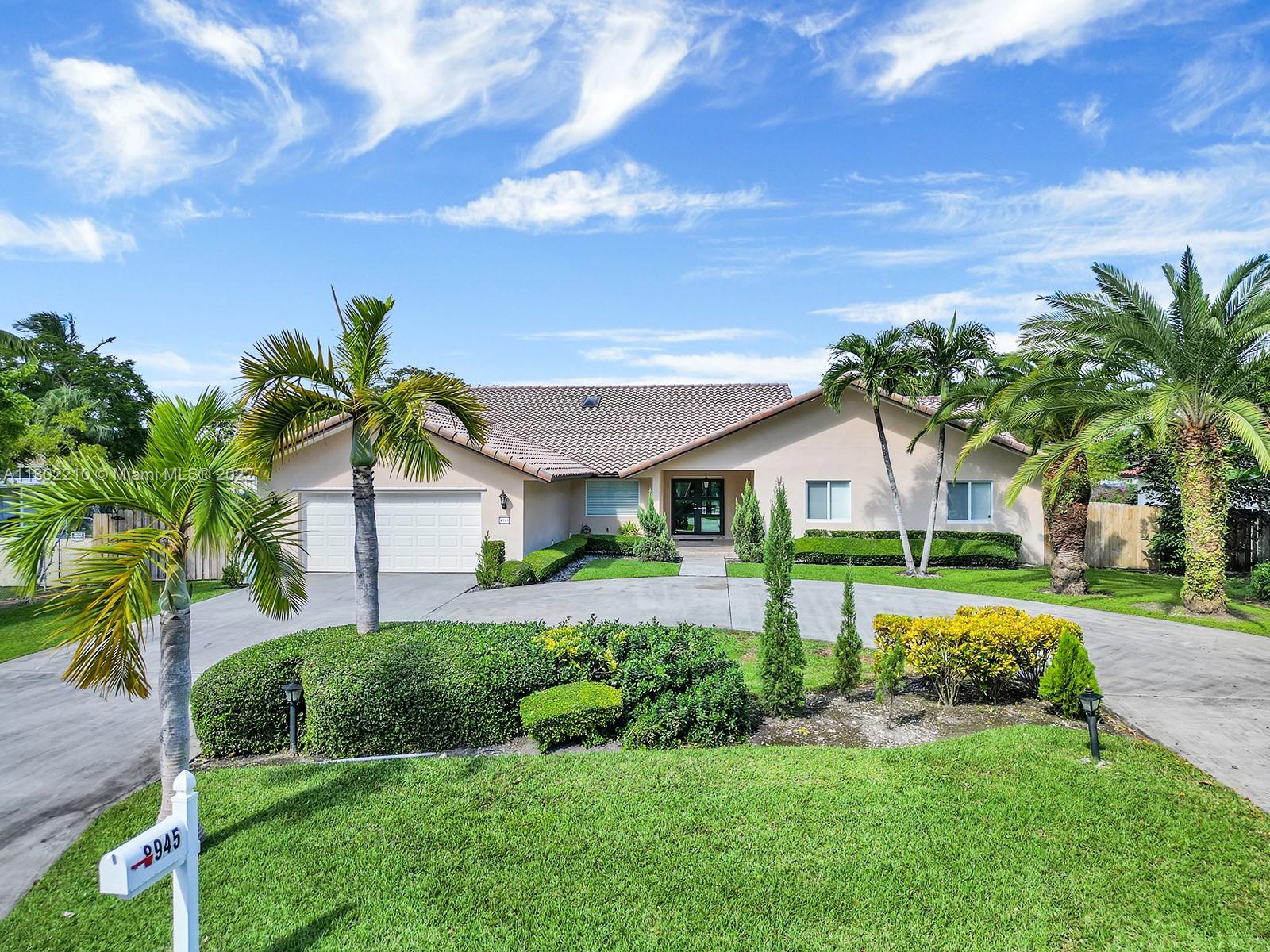 Welcome home to beautiful Palmetto Bay! Considered a top place to live in Florida, this family-friendly community is in an A-rated school district with lush tree-lined streets & a sparse suburban feel.
Make this bright, open-concept home yours! Lots of space for entertaining & bringing the family together. This 4/2.5 on a 0.52-acre lot has natural light, high vaulted ceilings, sky lights in common areas, 2-car garage & a wide covered patio overlooking the pool & huge yard for the kids & dog(s) to enjoy! Beautifully renovated with impact-resistant front door, vinyl floors, closets, water heater, huge kitchen island with a quartz countertop to fit the whole family & new sprinklers. The master bedroom boasts walk-in closets with built-ins & the 3 other bedrooms are light and spacious, too!