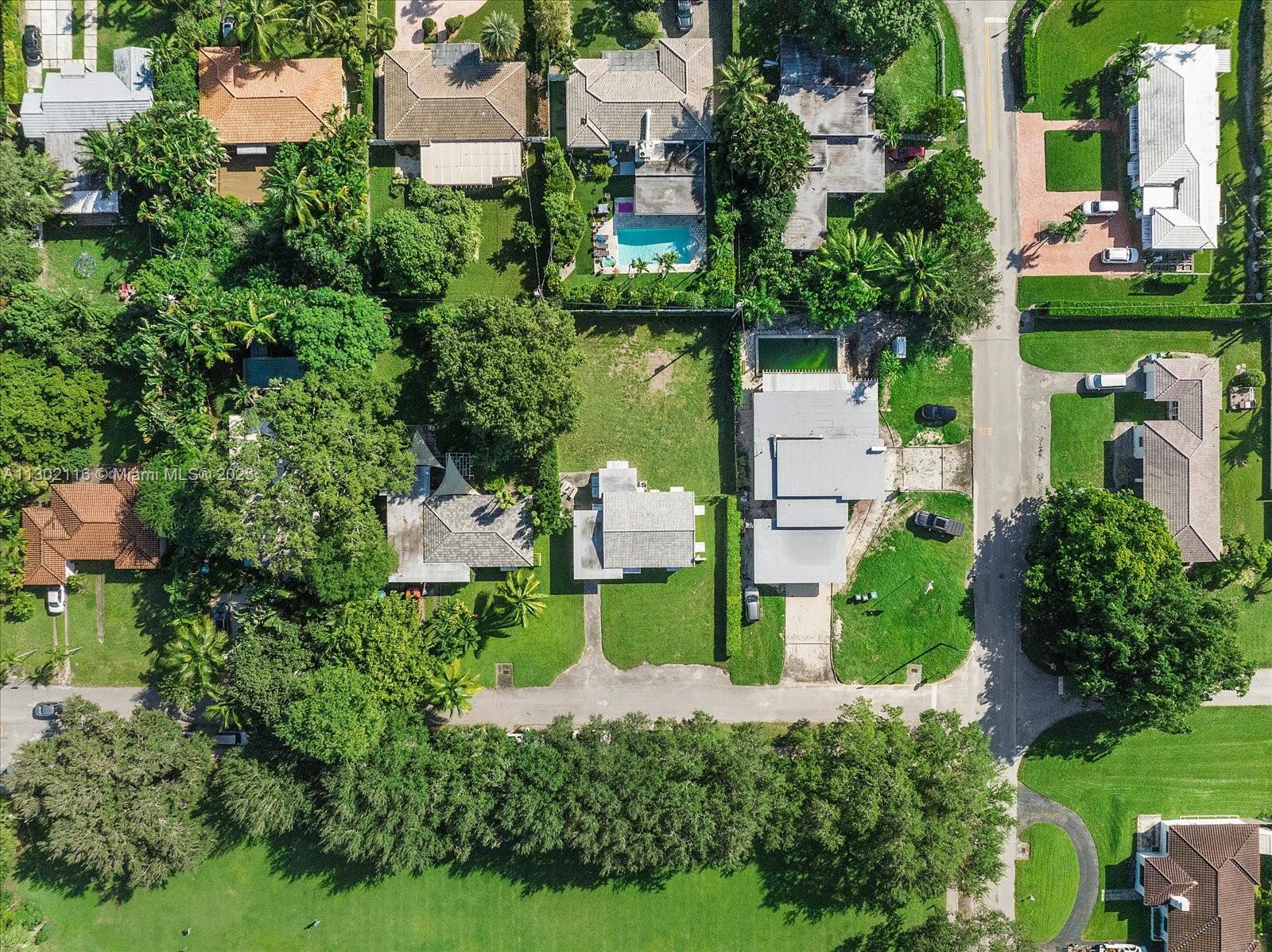 Arial view of the lot and existing home