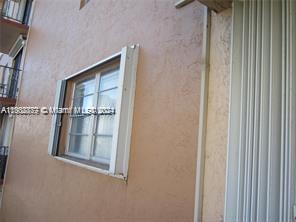 BALCONY GLASS WITH SHUTTERS