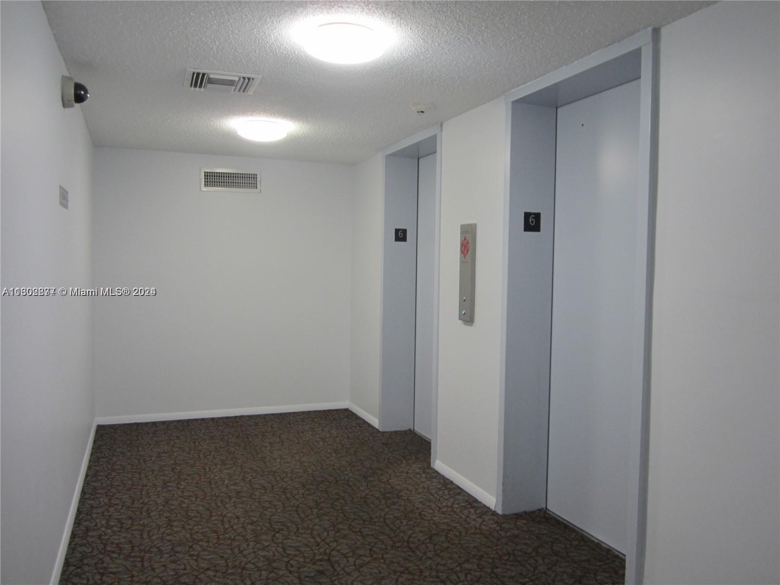 LAUNDRY ROOM OUTSIDE THE UNIT