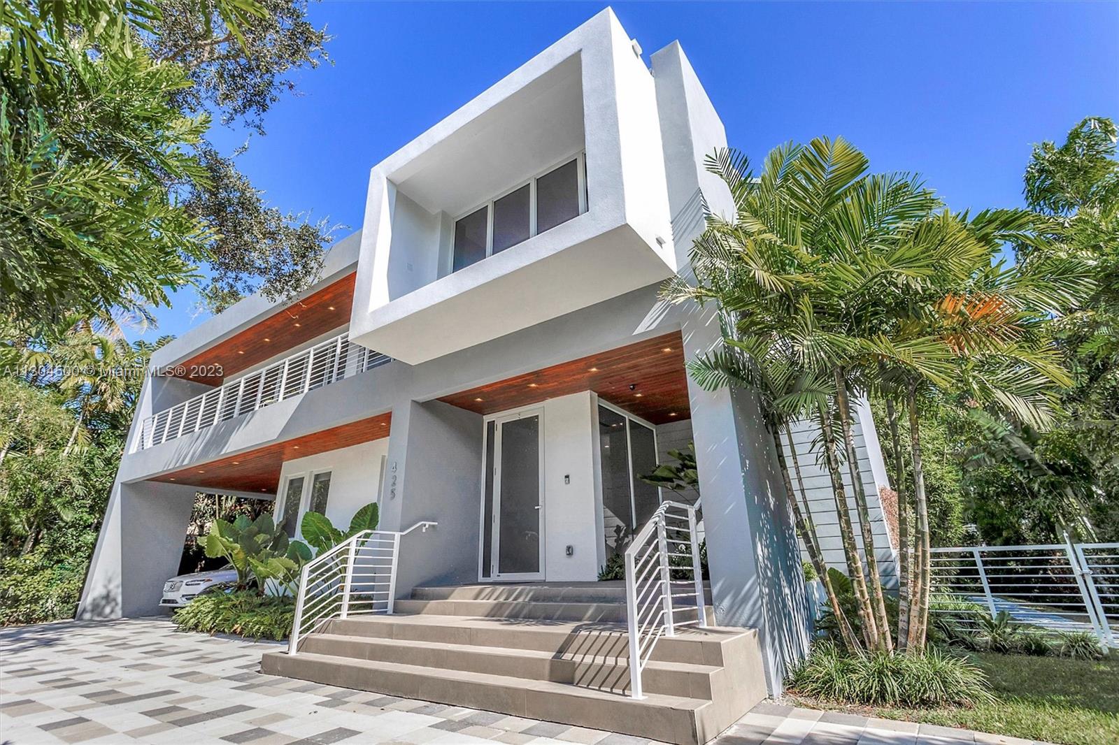 Spectacular contemporary home in one of Key Biscayne's most desired streets. Built in 2020, this house features 7 bedrooms, 7 bathrooms plus 2 more powder rooms and sits on an oversized 9,258 sqft lot. Stylishly upgraded with custom built-ins and masterfully designed to integrate indoor and outdoor spaces. Open floor plan brings in lots of natural light. Enjoy the beautiful views from the rooftop terrace or one of the upstairs galleries. Beautifully landscaped garden, heated saltwater pool, brand new summer kitchen and cabana bathroom make this the perfect home to entertain. Elevator connects all three floors. Open garage features an EV charging station. Driveway fits several cars.