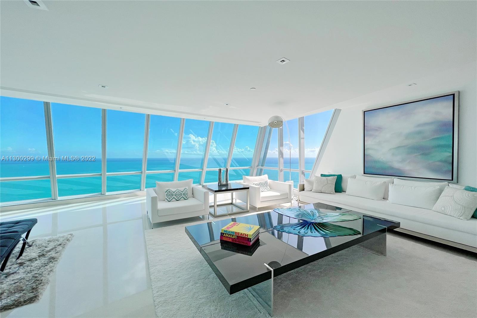 Jade Ocean PH 4803 is the ultimate home in the sky with breathtaking 360-degree views of the ocean, downtown Miami and the inter coastal. This home features 8,332 SF living space, 5 bedrooms, 6/1 bathrooms, and a media room. Spectacular outdoor living at its finest offering appr. 2,000 SF of terraces and a spa. Each bedroom has a private terrace and en-suite. This exceptionally  priced PH is being sold furnished. Jade Ocean amenities include 2 pools, beach service, children's playroom, business center, spa, fitness center, concierge, valet, and doorman. SEE BROKER REMARKS