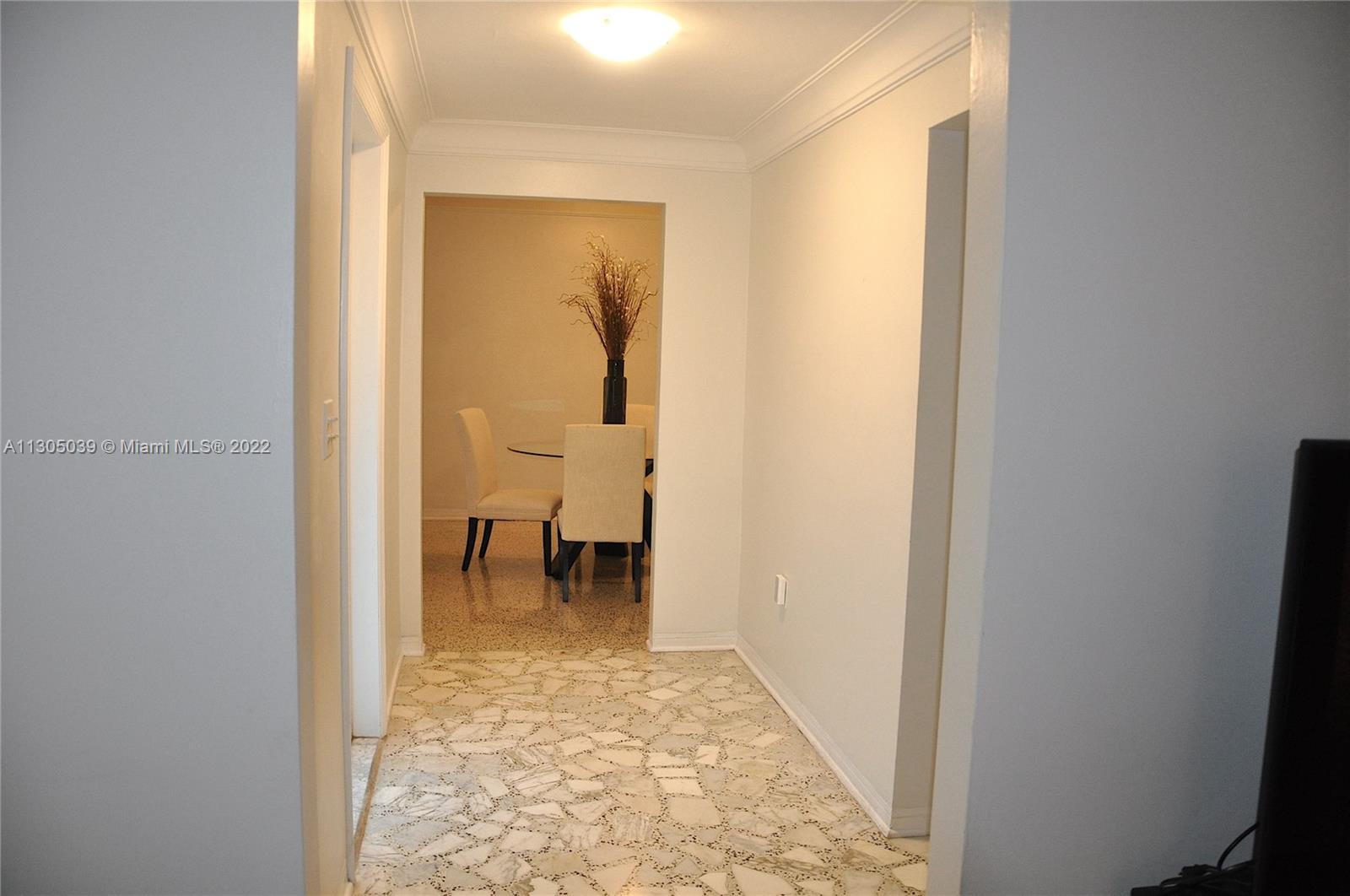 Foyer and entry to dining room and living room