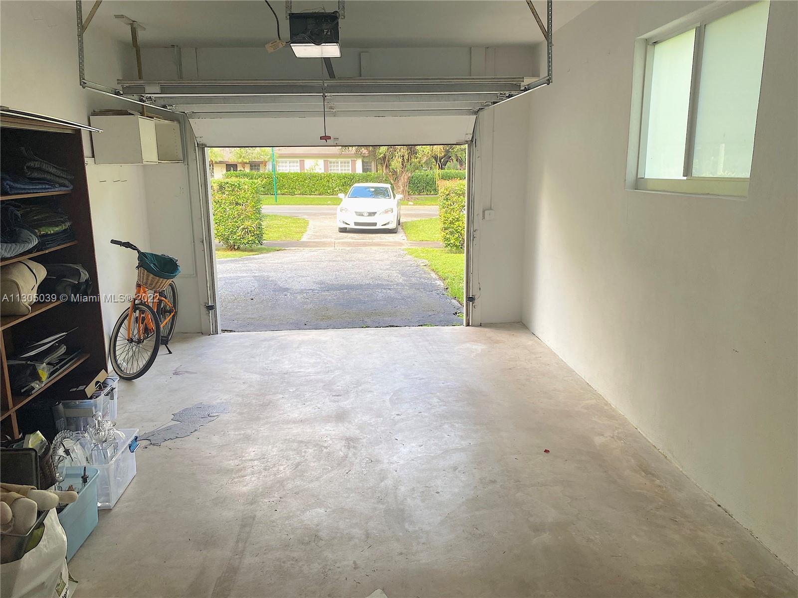 One car garage and laundry area
