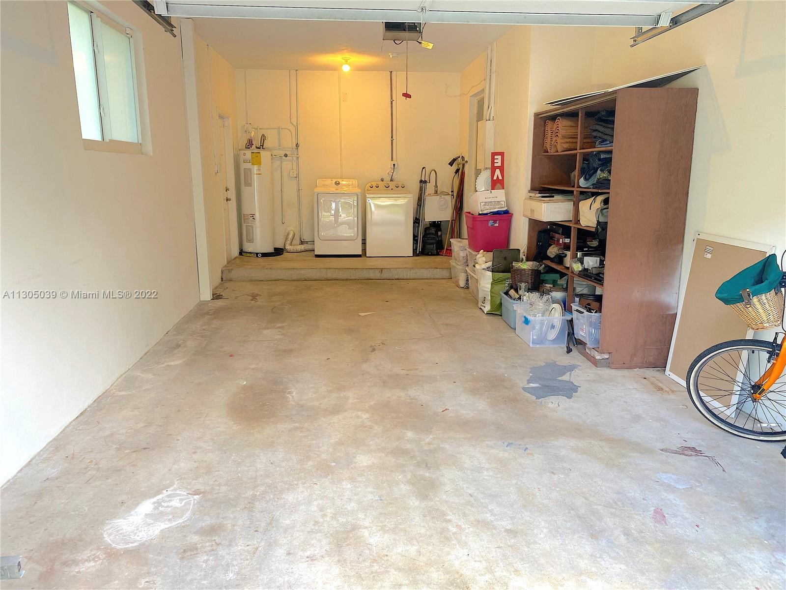 One car garage and laundry area
