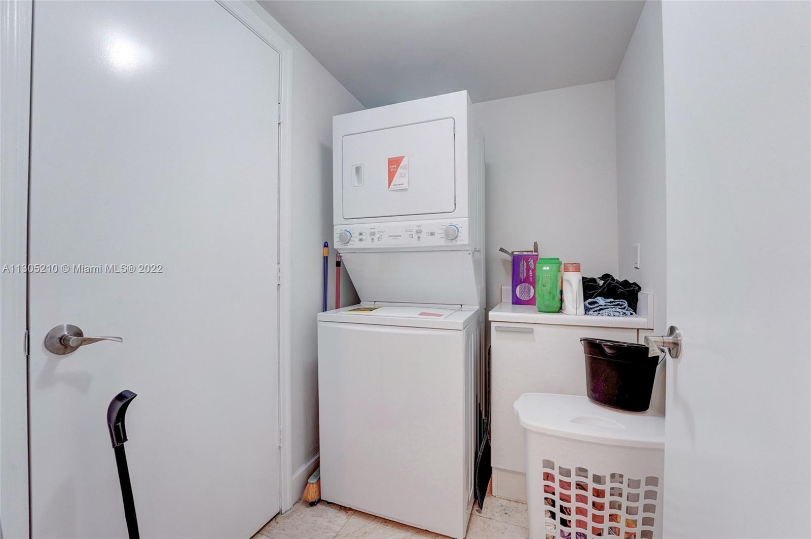 Laundry room with stackable washer and dryer