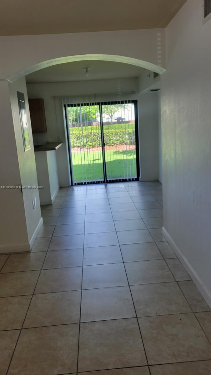 Beautiful and spacious 3 bedrooms, 2 full bathrooms unit, located on the first floor. Tile and carpet floors, central cooling, parking space, and guest parking. The condo includes excellent amenities such as a community pool, gym, clubhouse, and walking paths.