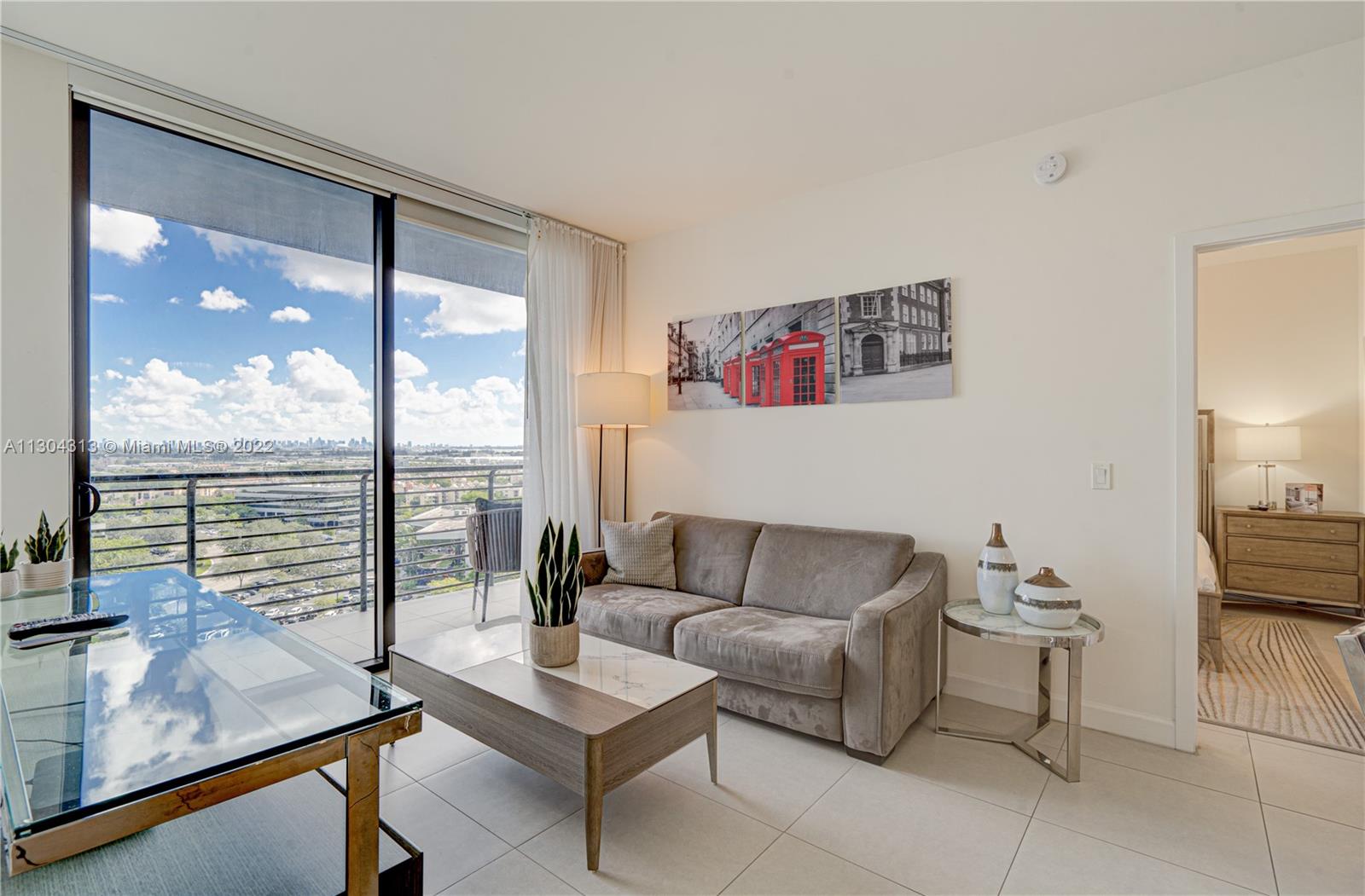 Welcome to this beautiful residence in the heart of Downtown Doral! It is located within steps of schools, restaurants, shops, park, golf course and more. This condominium has two separate entrances so it can be a 2/2 home or a one bedroom condo with living room, full kitchen plus washer/dryer and a separate studio with coffee maker, mini fridge and microwave. You can live in one side and rent the other one or rent/use both. It comes completely furnished and ready to be occupied. It is currently in the short term rental program with a management office onsite.